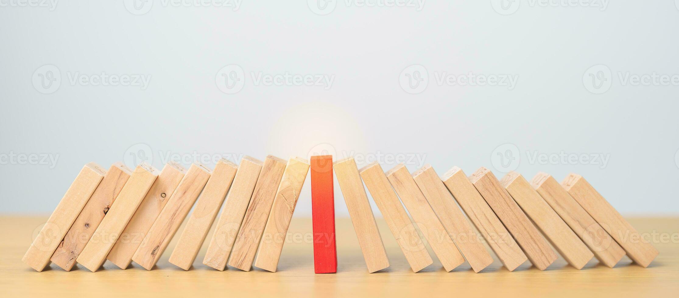 wood domino blocks falling on table. Crisis, fall Business, Risk management, Economic recession, Strategy and solutions concept photo