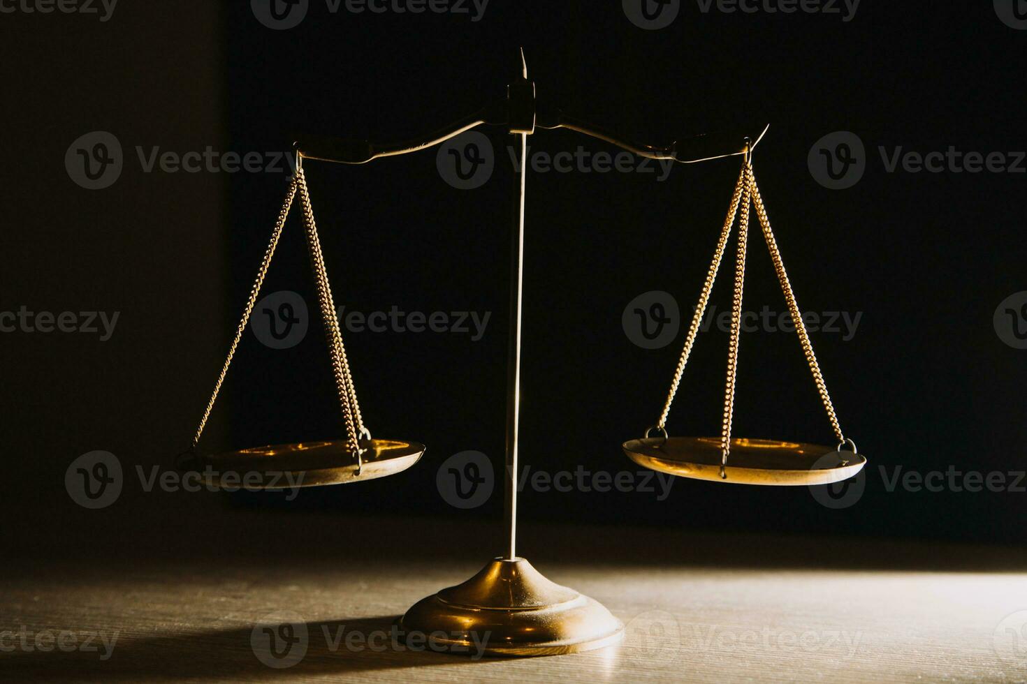 Business and lawyers discussing contract papers with brass scale on desk in office. Law, legal services, advice, justice and law concept picture with film grain effect photo