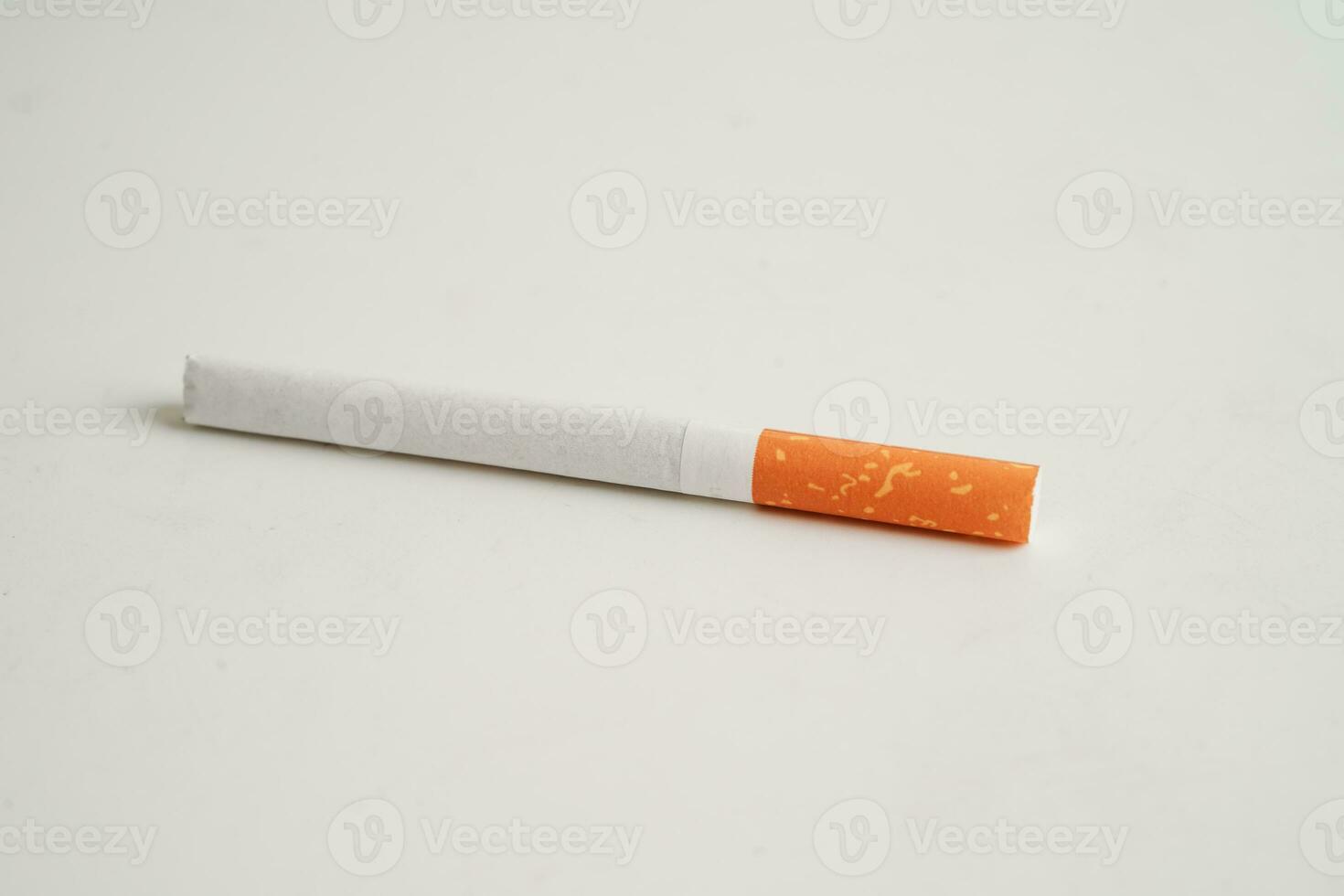 Cigarette, roll tobacco in paper with filter tube, No smoking concept. photo