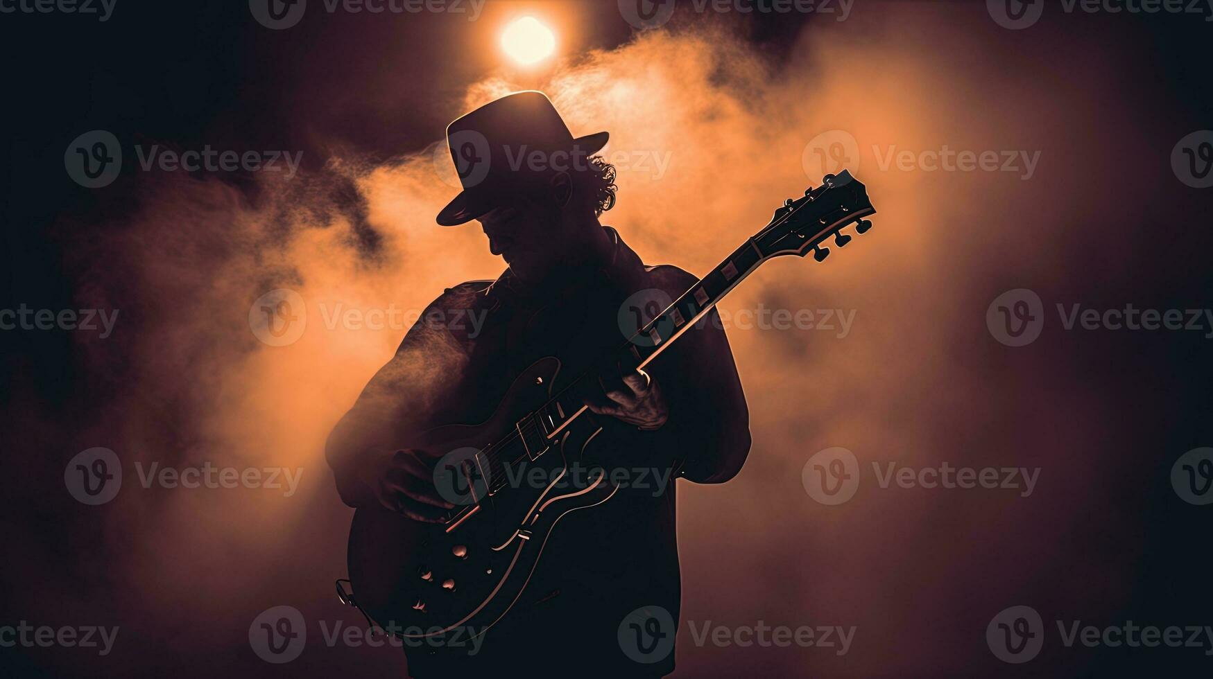Retro style photo of guitarist s silhouette surrounded by smoke in concert