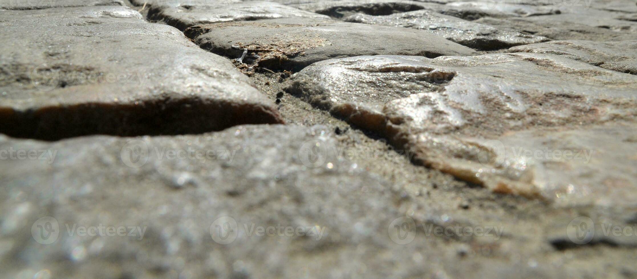 Road pavement made of stones photo