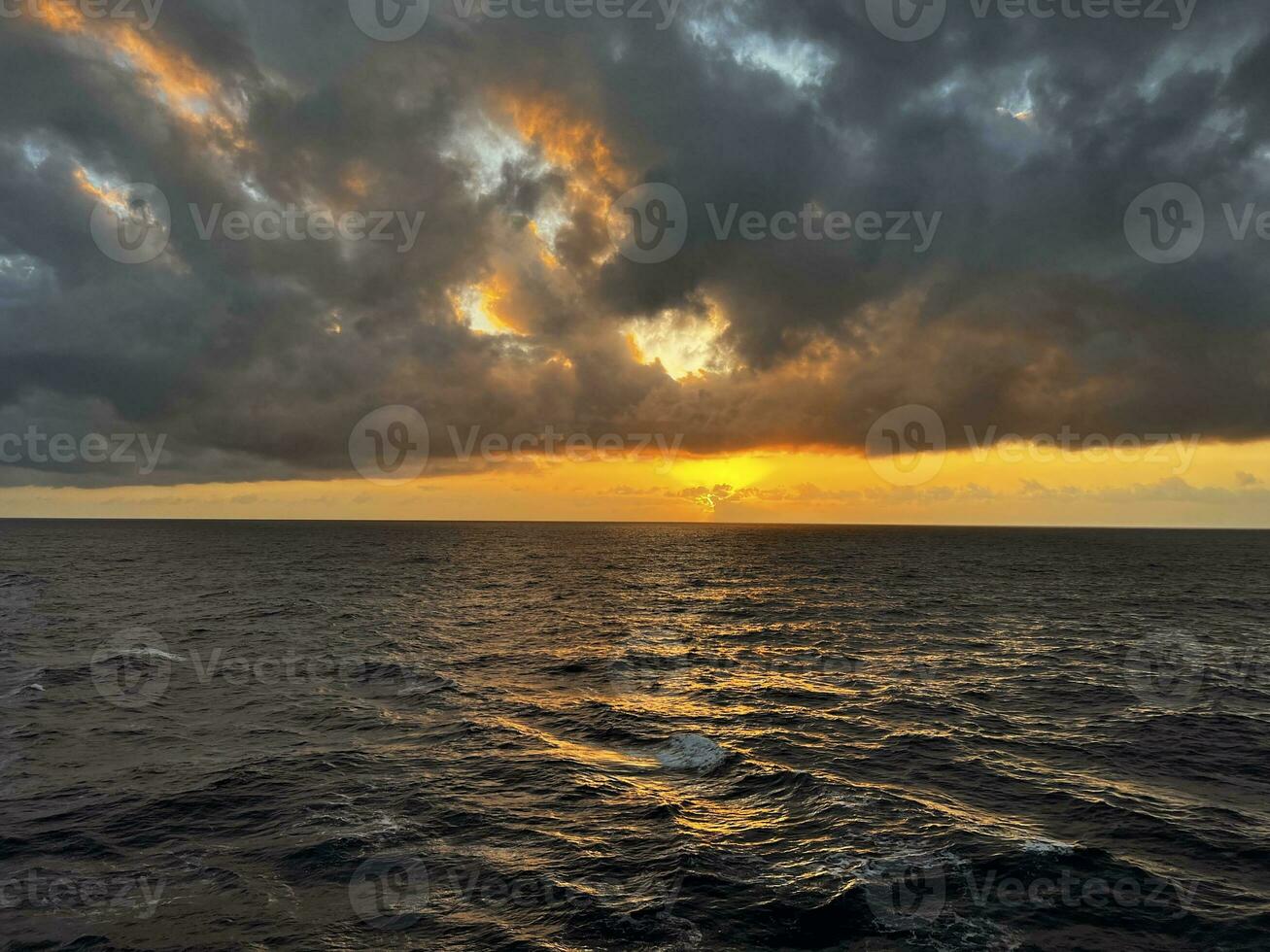 Sunrise in the middle of the Indian Ocean photo