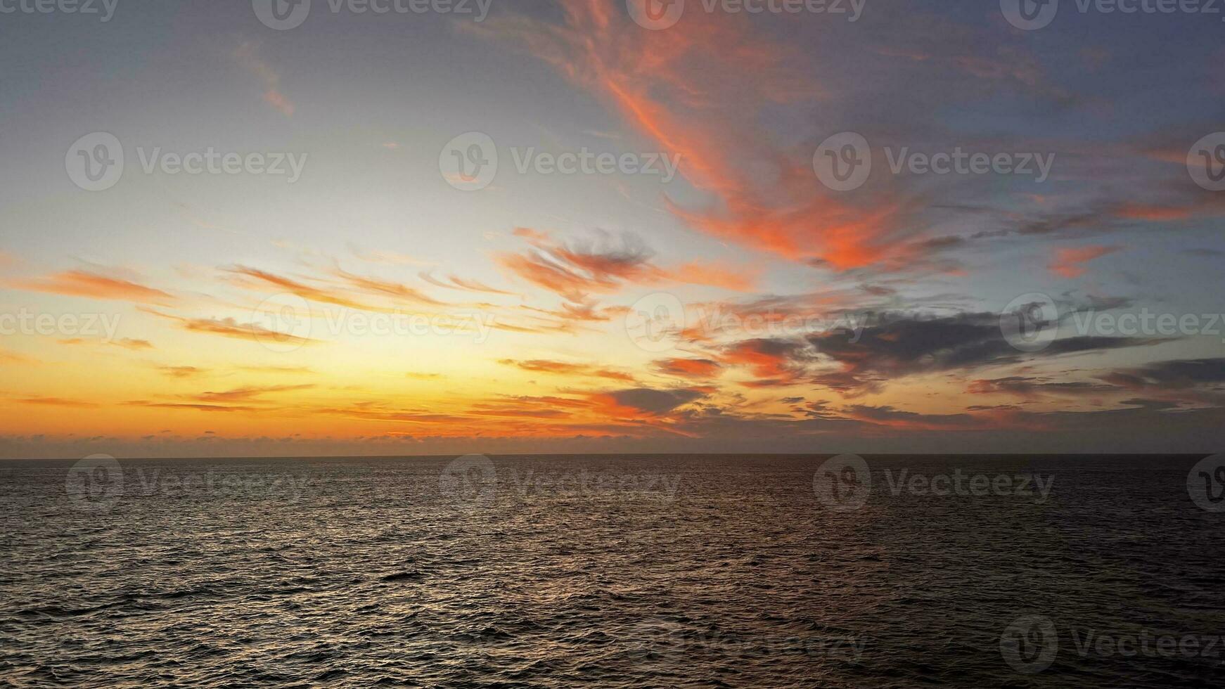 Sunset in the middle of the Indian Ocean photo