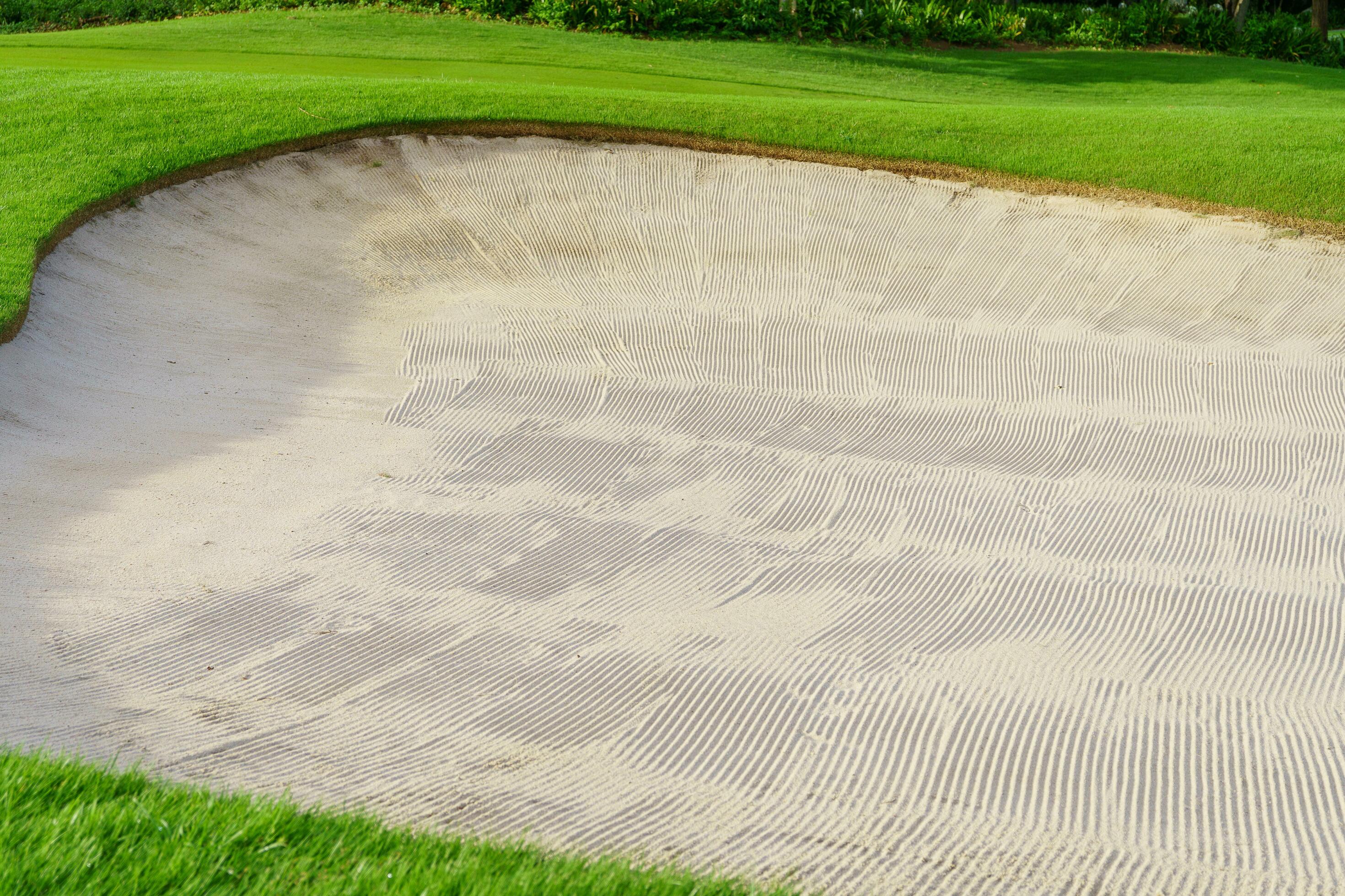 Golf Course Sand Pit Bunkers, green grass surrounding the beautiful