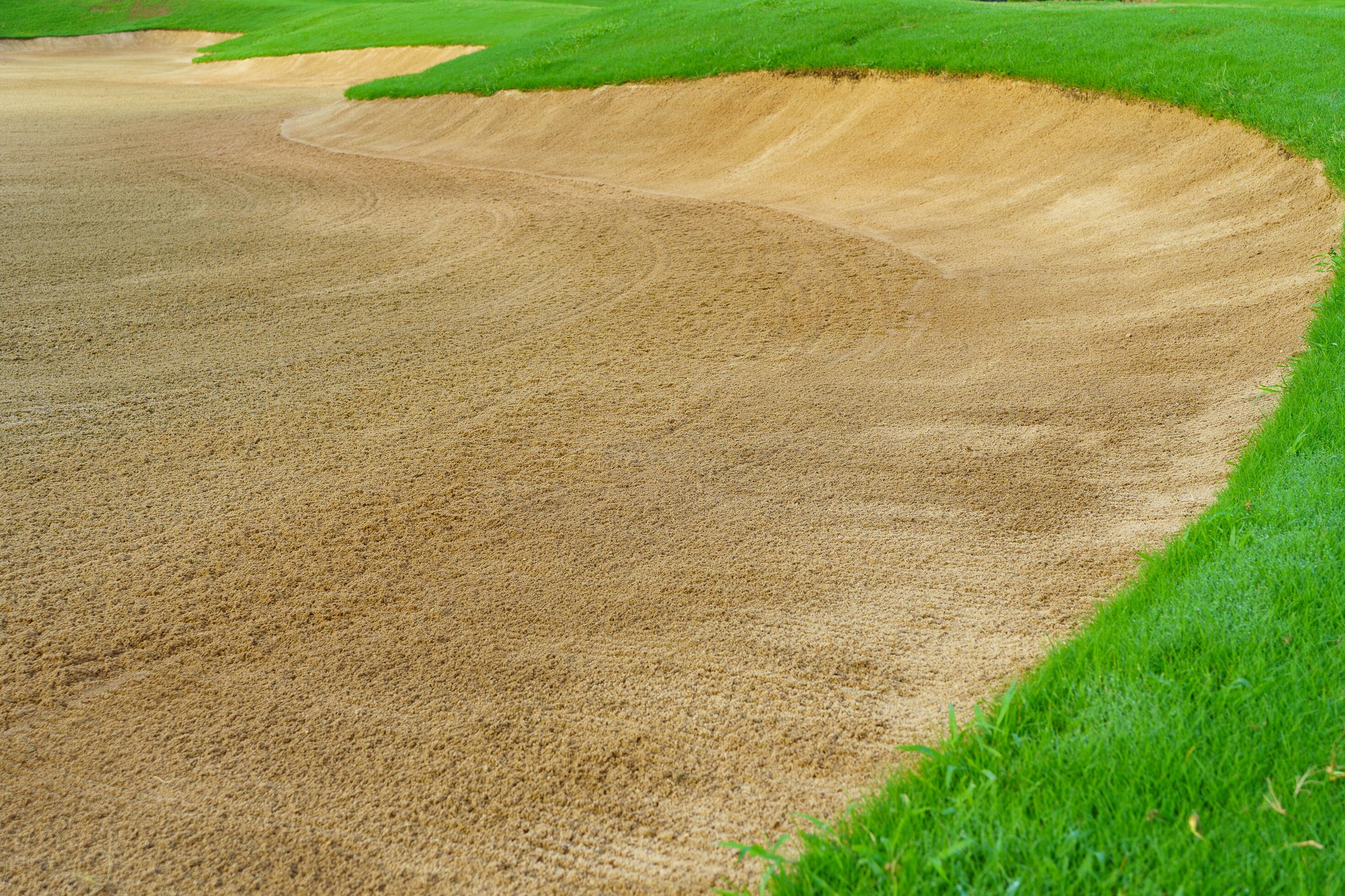 Golf Course Sand Pit Bunkers, green grass surrounding the beautiful