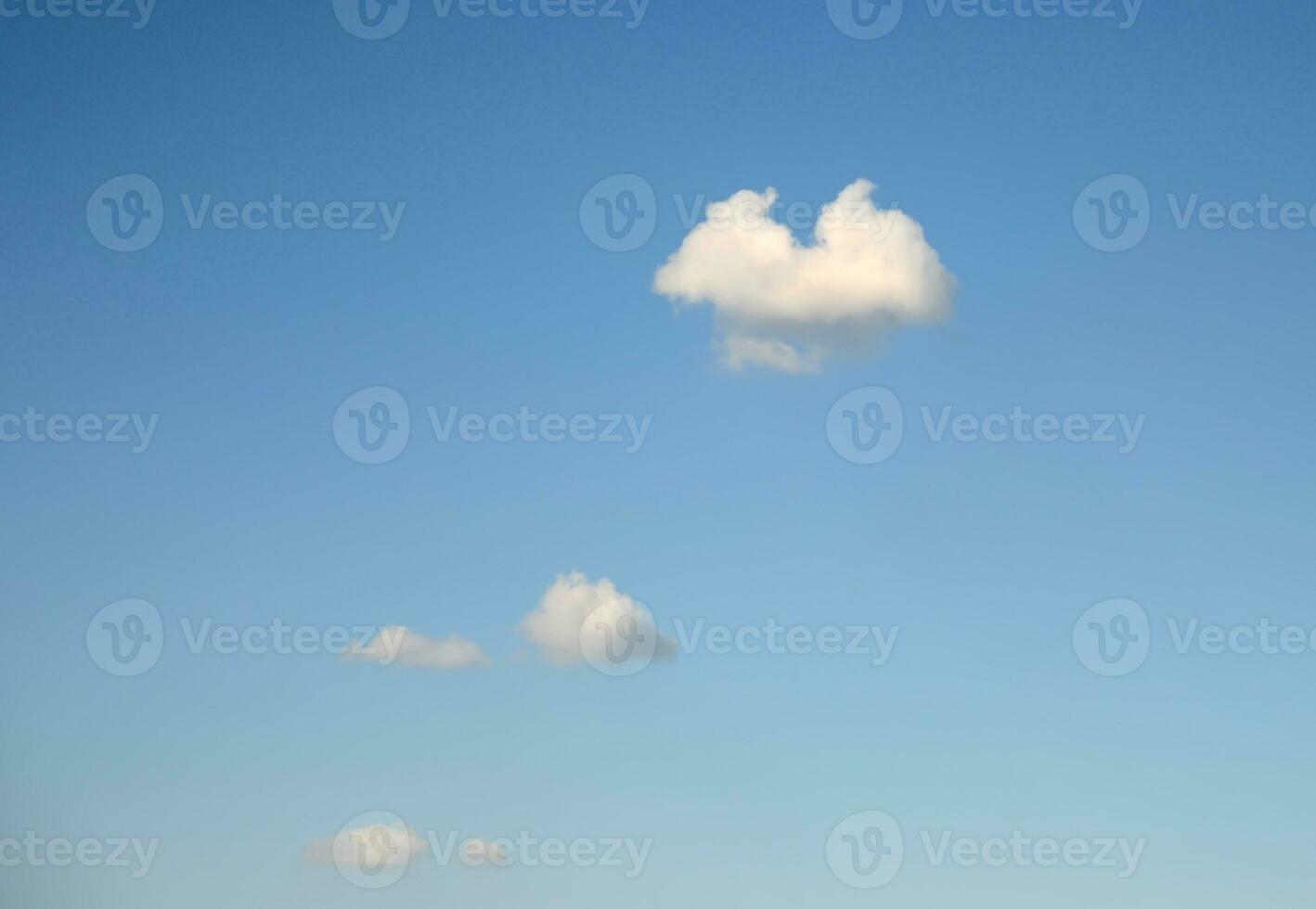 White cumulus clouds flying photo