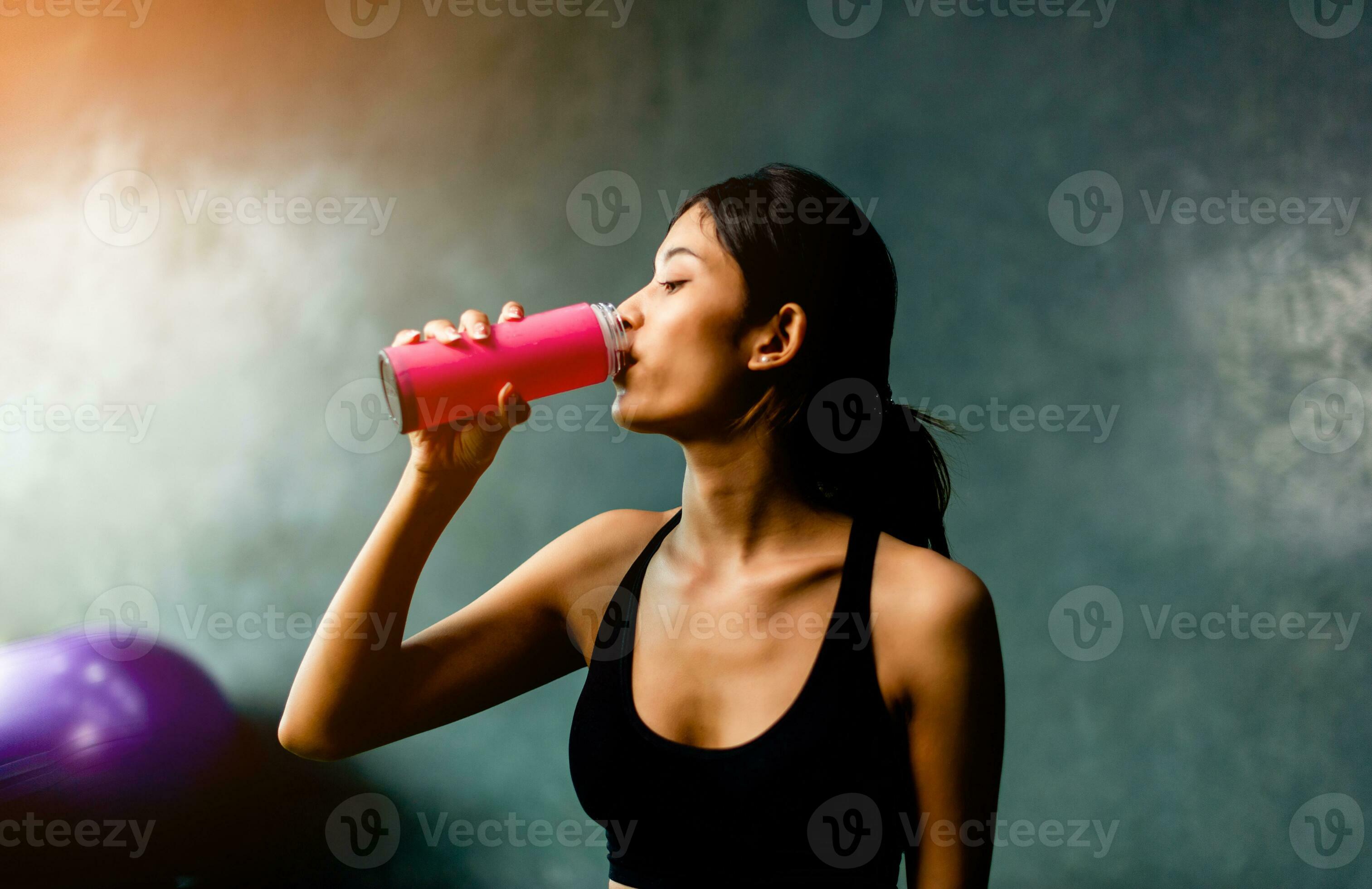 Drink water after exercising and sweating from strenuous exercise. tiredness from exercise