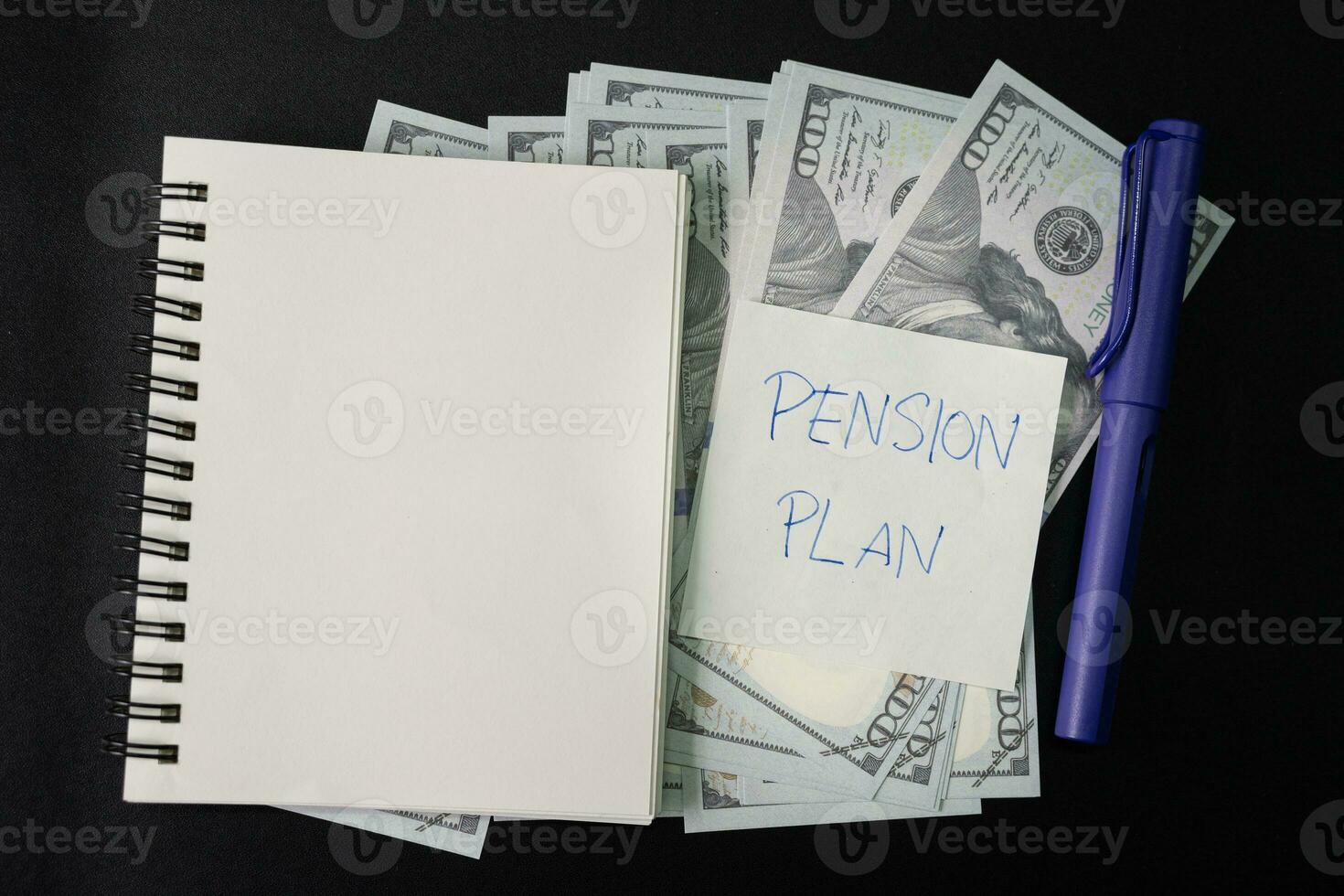 Paper note with text written PENSION PLAN. Investments Concept. Pension Plan. Retirement concept. Pension calculation concept. photo