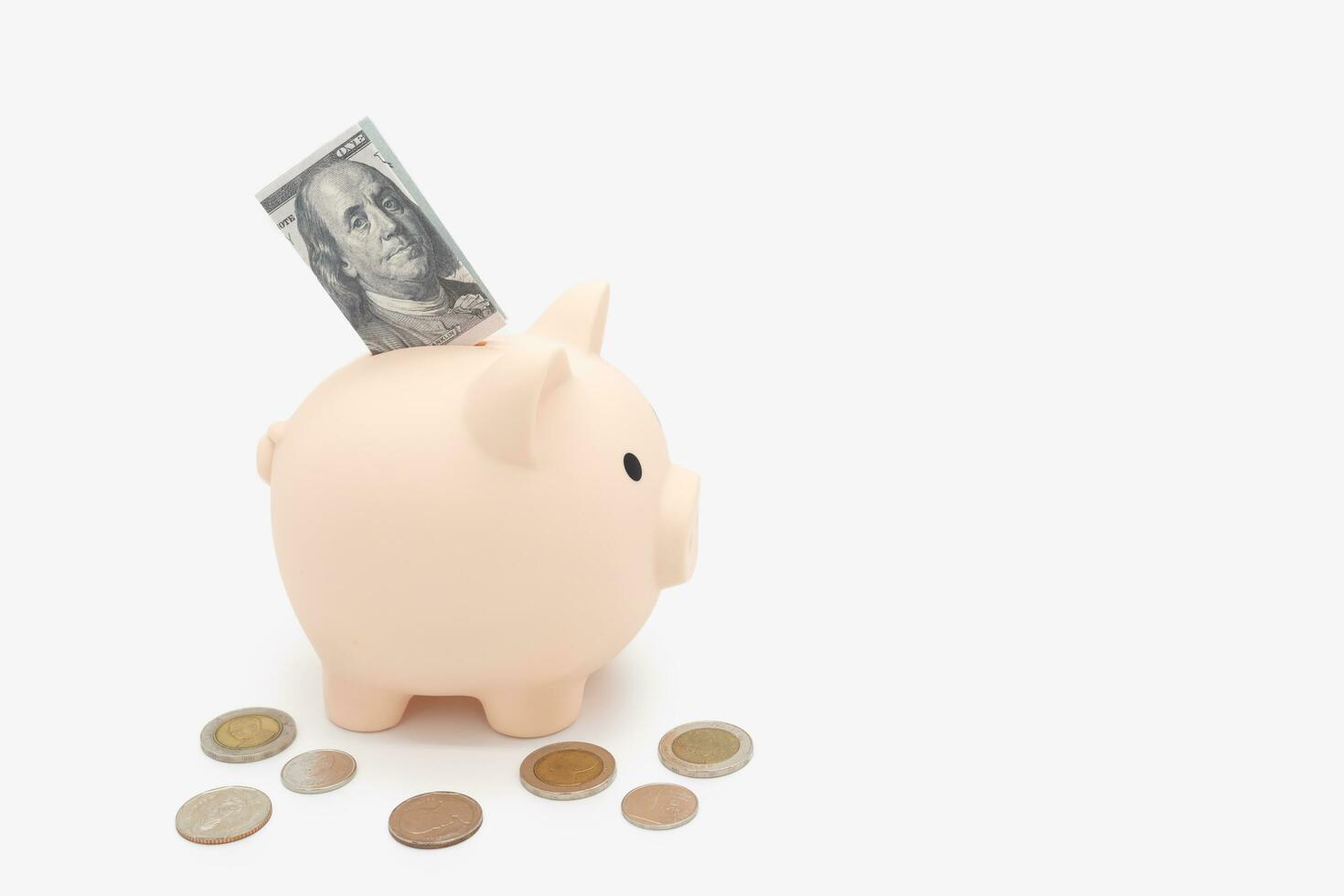Putting coin in piggy bank, planning budget, investment strategy, saving money. piggy bank saving money for future plan and retirement fund, Business or finance saving. isolated background. photo