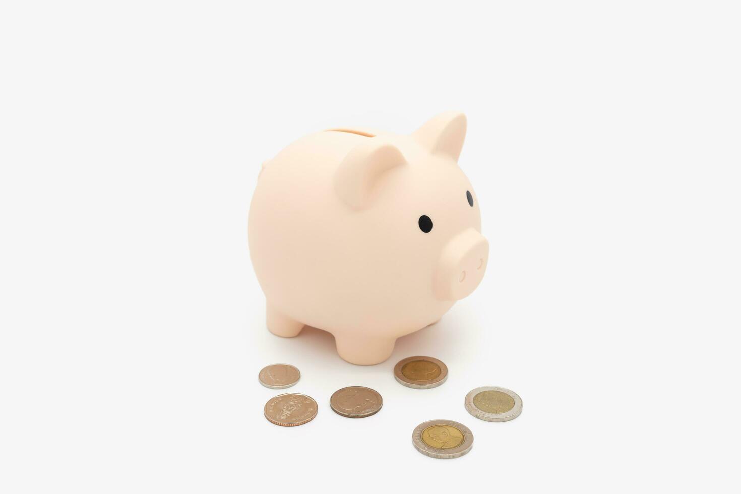 Putting coin in piggy bank, planning budget, investment strategy, saving money. piggy bank saving money for future plan and retirement fund, Business or finance saving. isolated background. photo