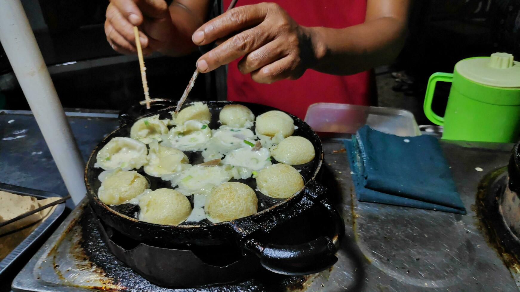 Process to cooking takoyaki most popular delicious snack photo
