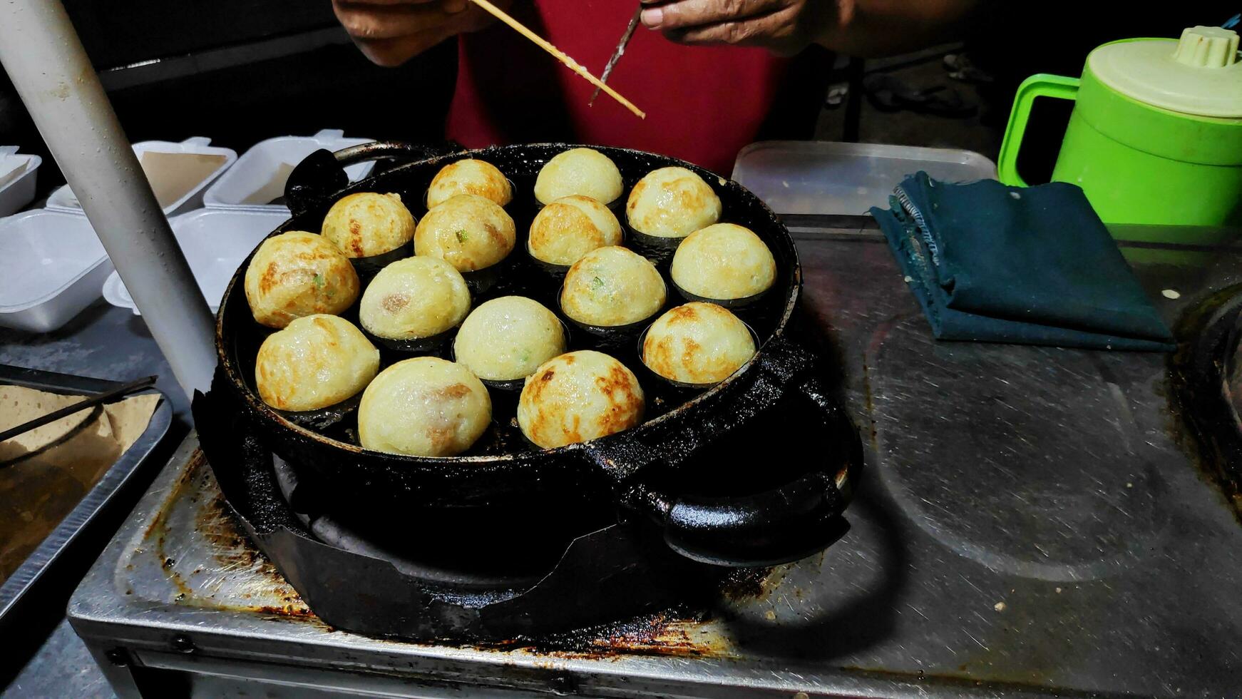 Process to cooking takoyaki most popular delicious snack photo