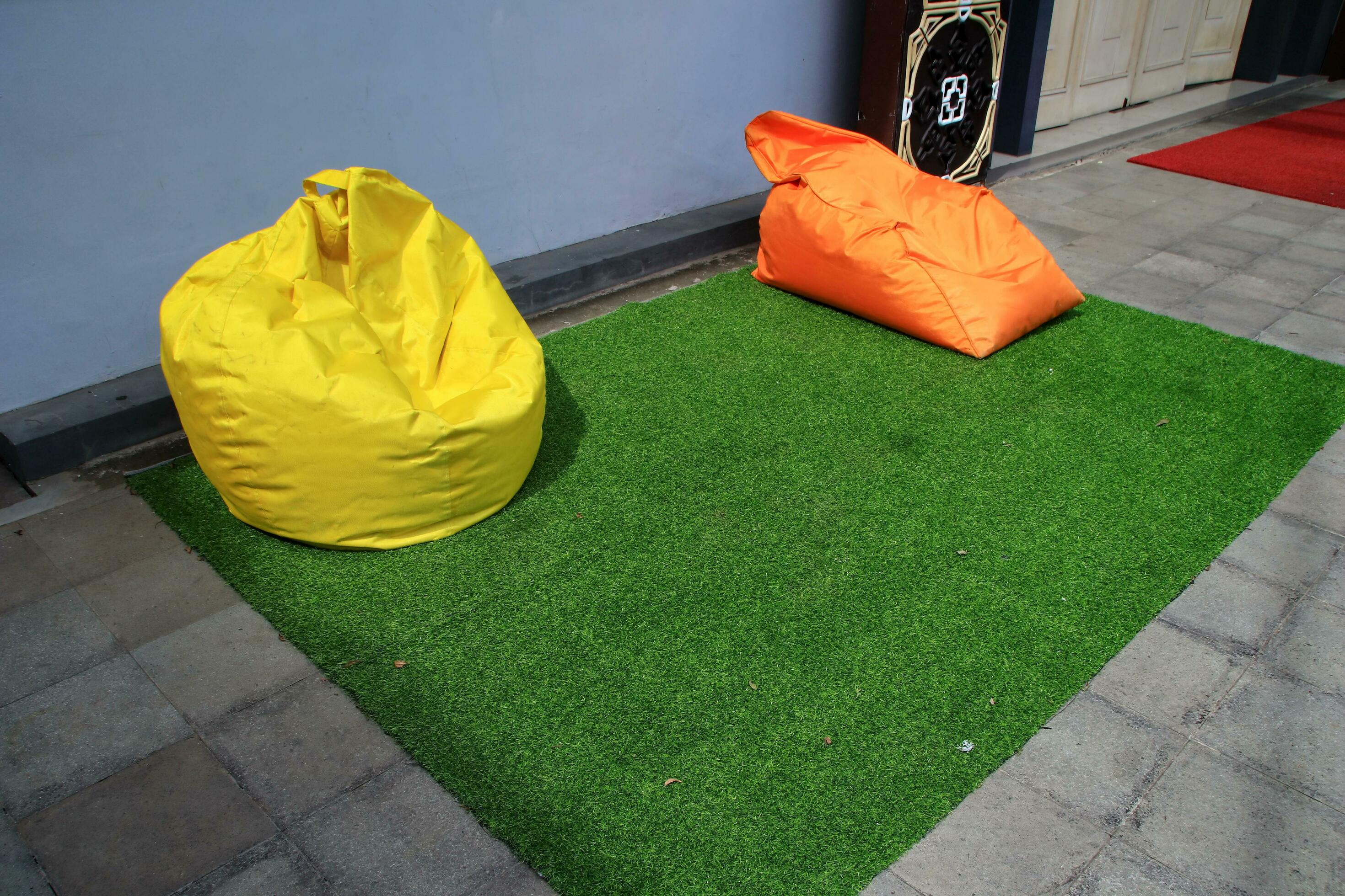 Bean Bag is a chair filled with styrofoam beads and without a frame