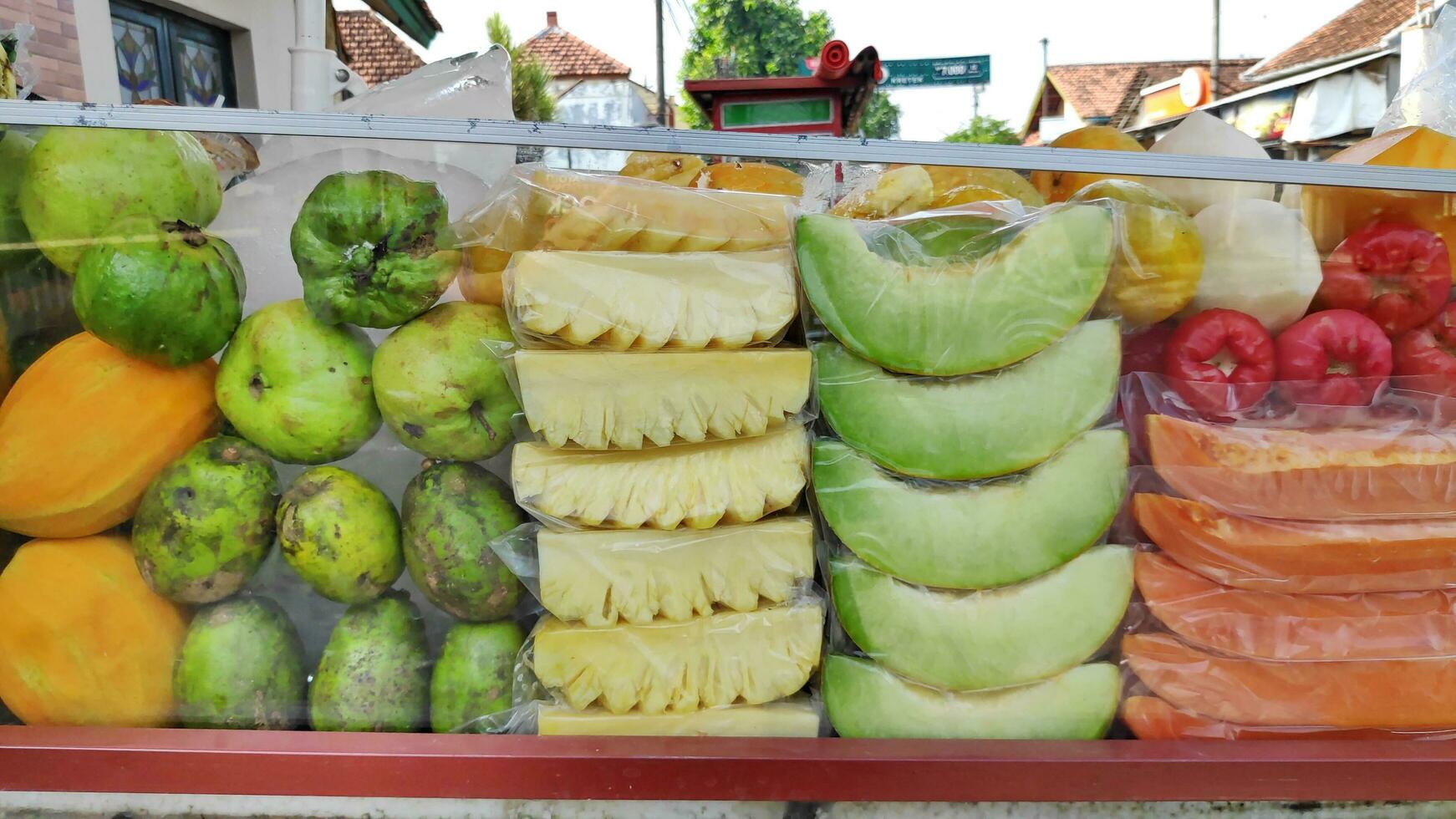 Fruit rujak cart by street vendors. Rujak fruit or traditional fruit salad from Indonesia photo