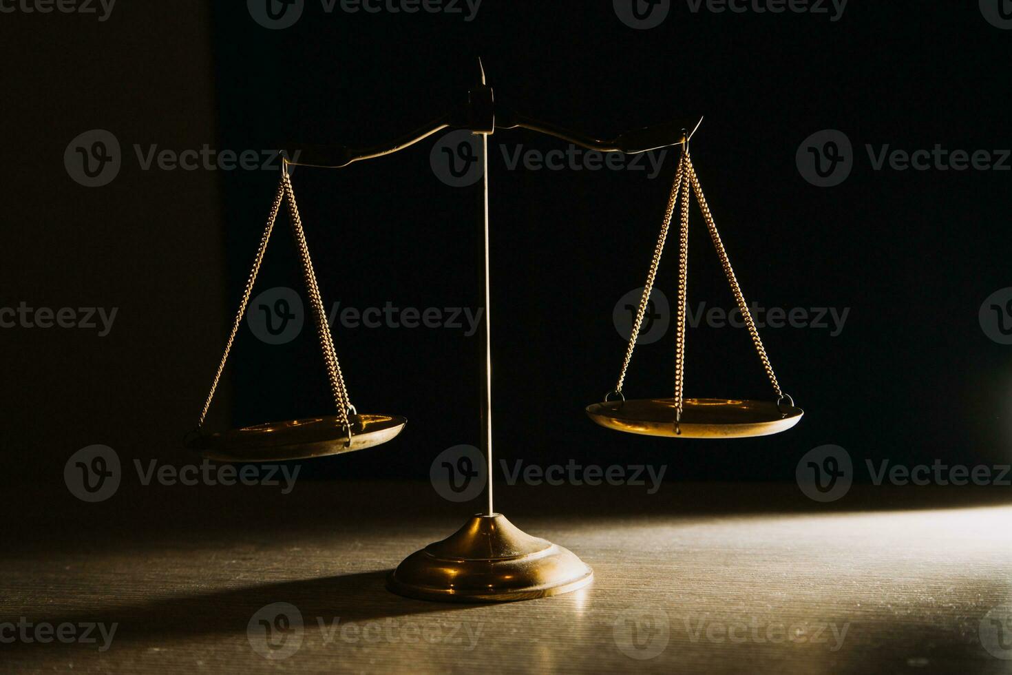 Business and lawyers discussing contract papers with brass scale on desk in office. Law, legal services, advice, justice and law concept picture with film grain effect photo