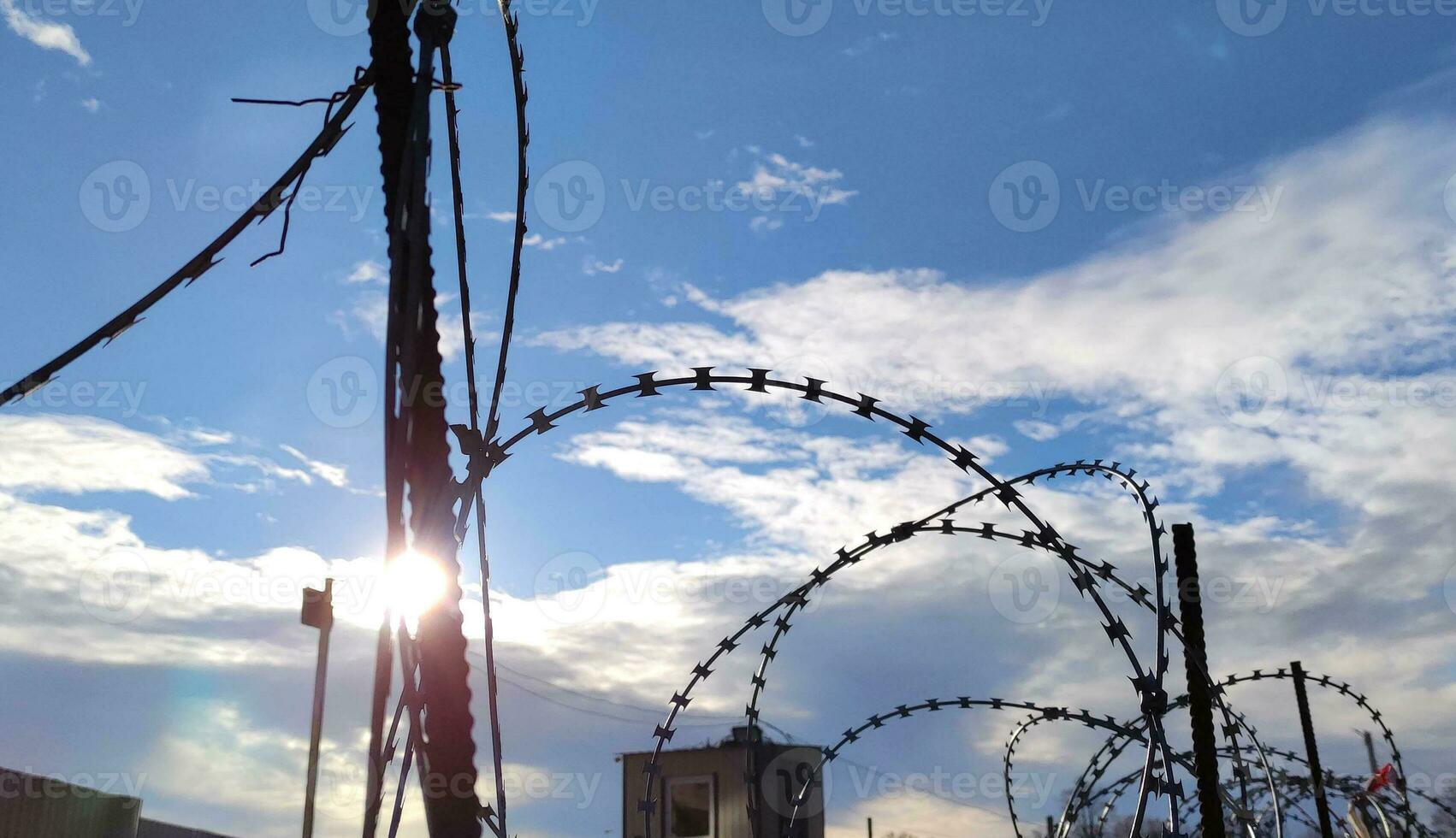 Barbed wire fence, prison and freedom conceptual background 27393713