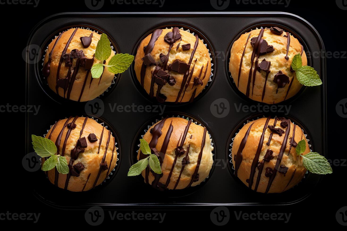 muffins with chocolate, top view, dark background. photo