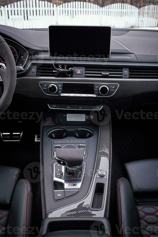 Modern car black leather interior background,  inside luxury city car photo