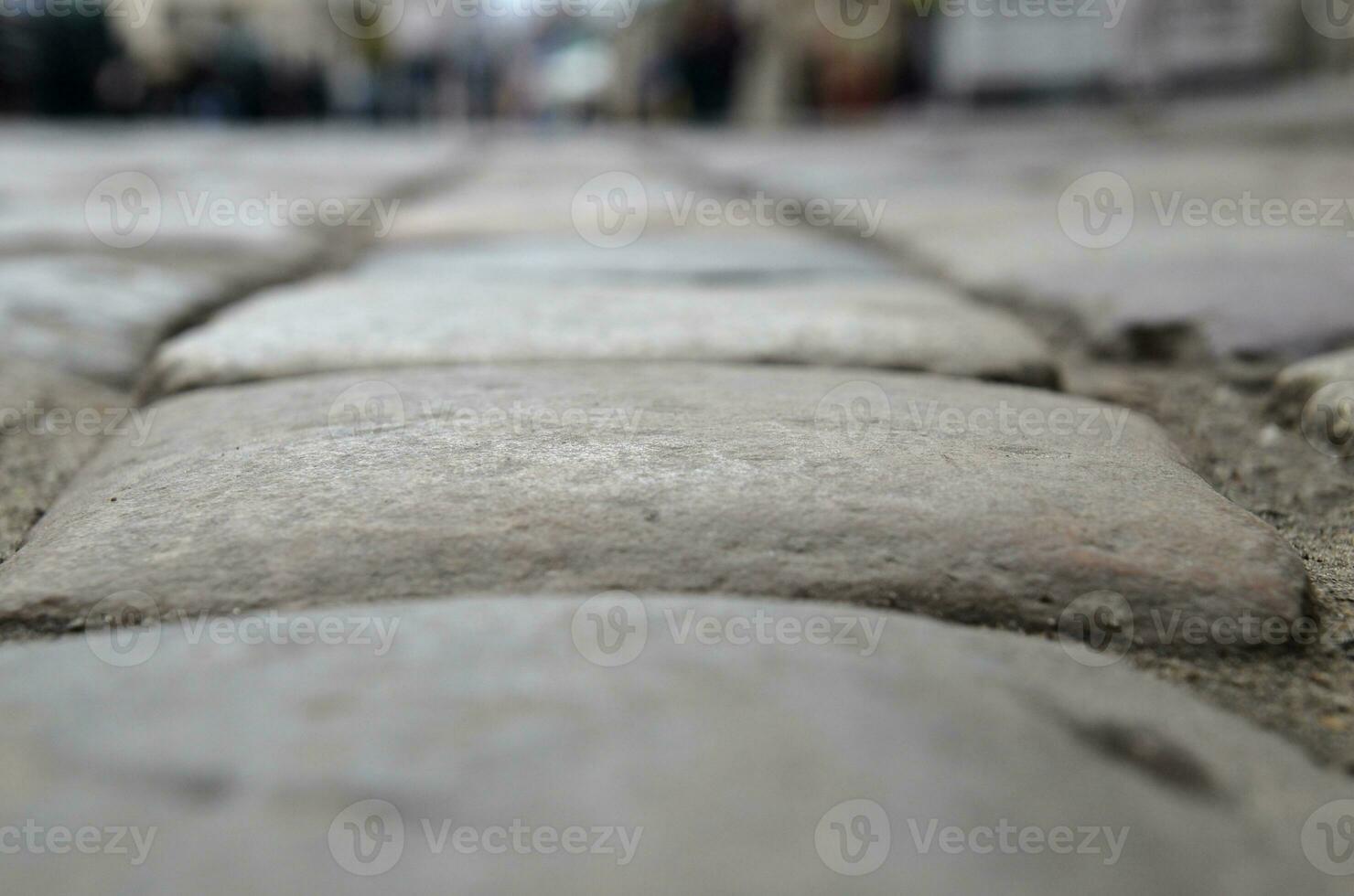 Stones of a paved road photo