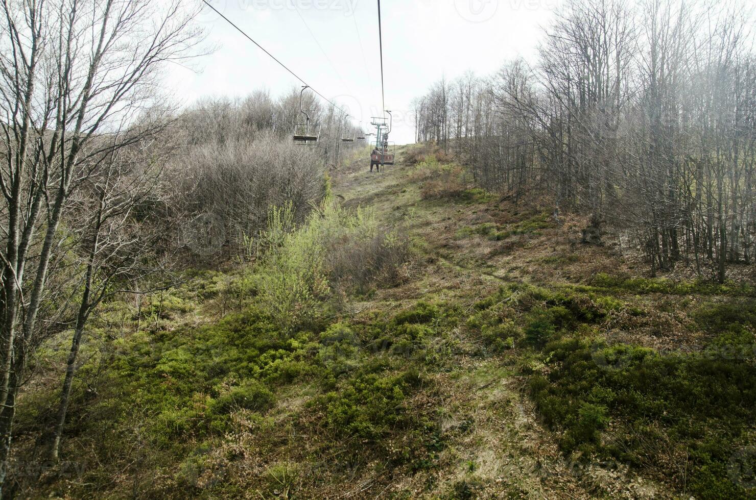 Chairlift in the mountains photo