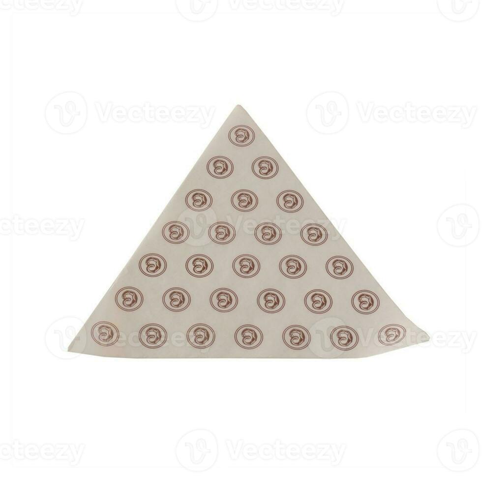 Triangle baking paper, bakery parchment isolated over white background, confectionery object photography photo