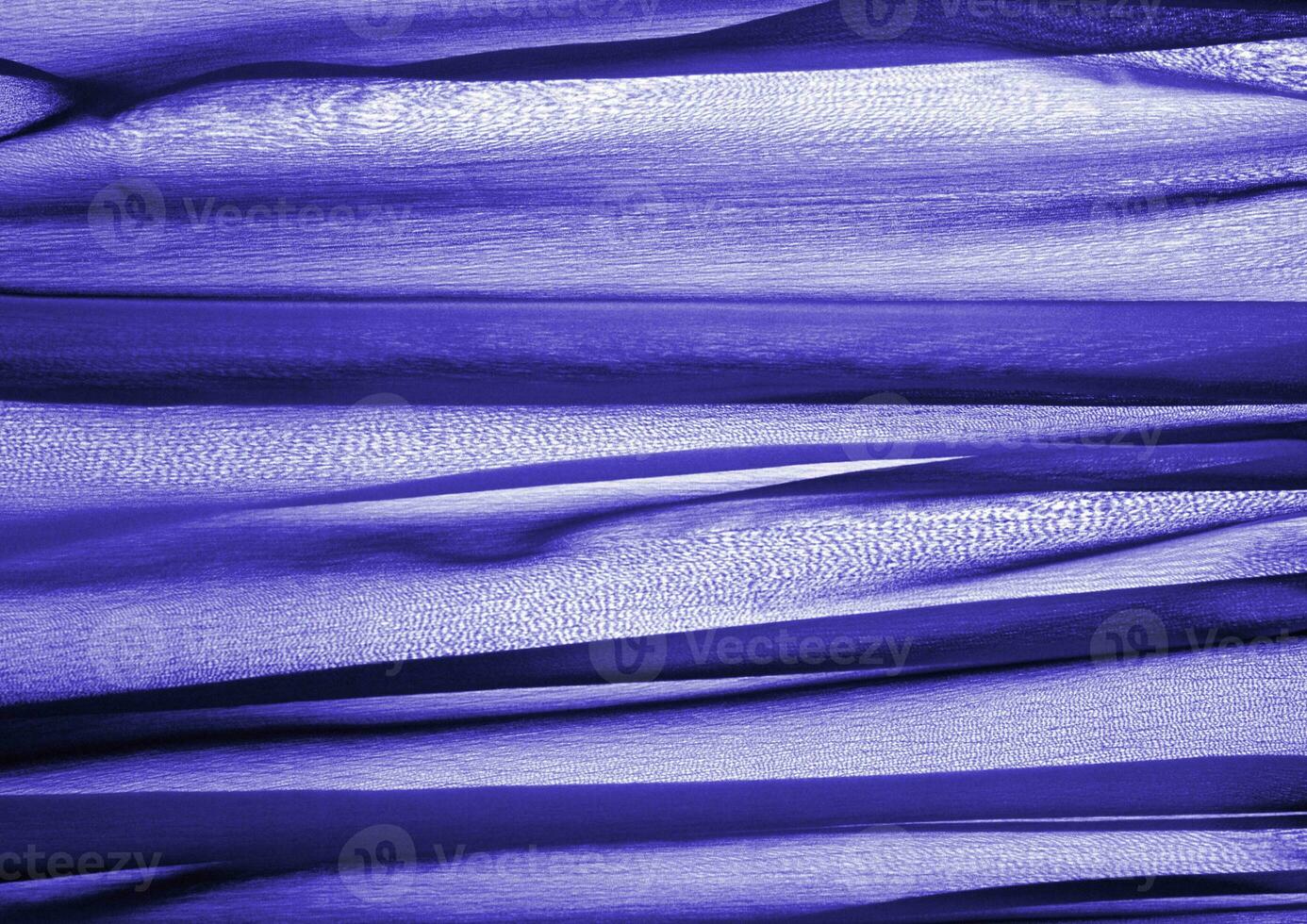 Deep blue glossy cloth texture background. Natural textile material photo, pattern cover photo