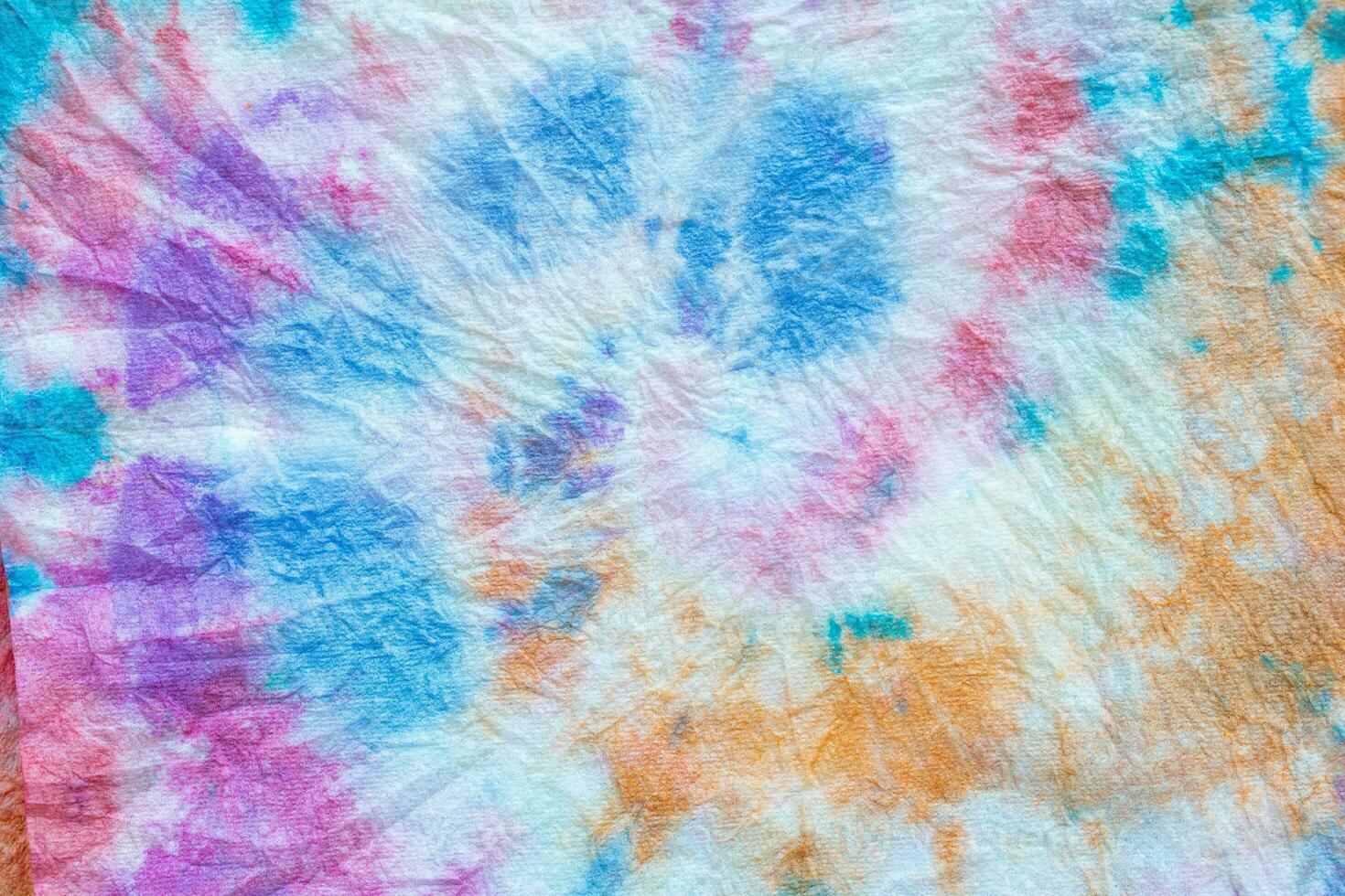 a tie dye fabric with a rainbow design photo