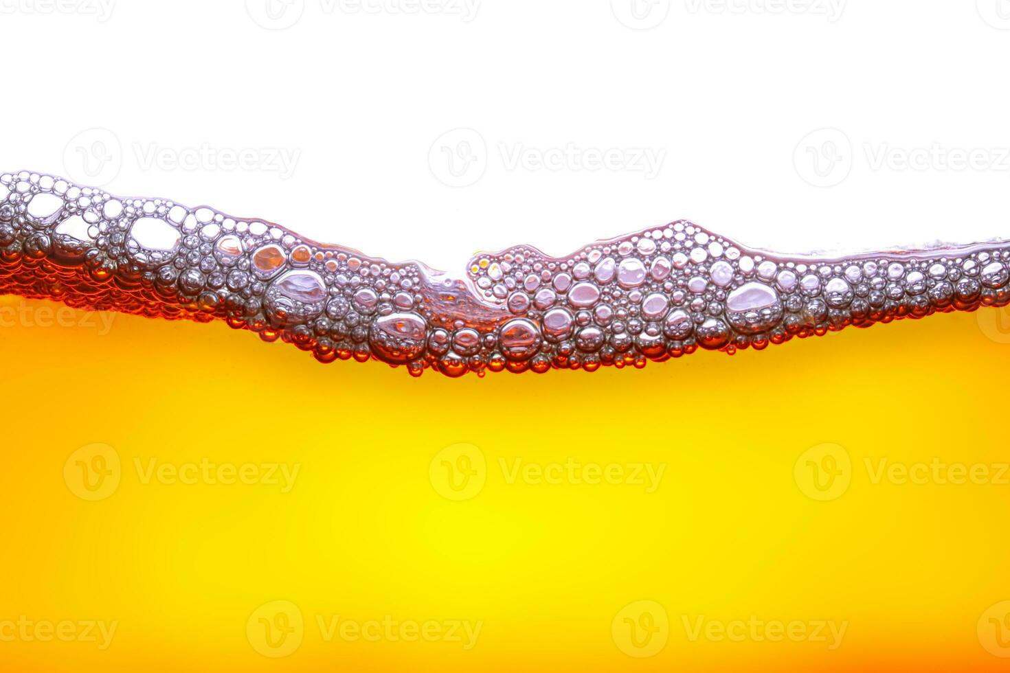 beautiful yellow-orange water waves and also beautiful bubbles, white background photo