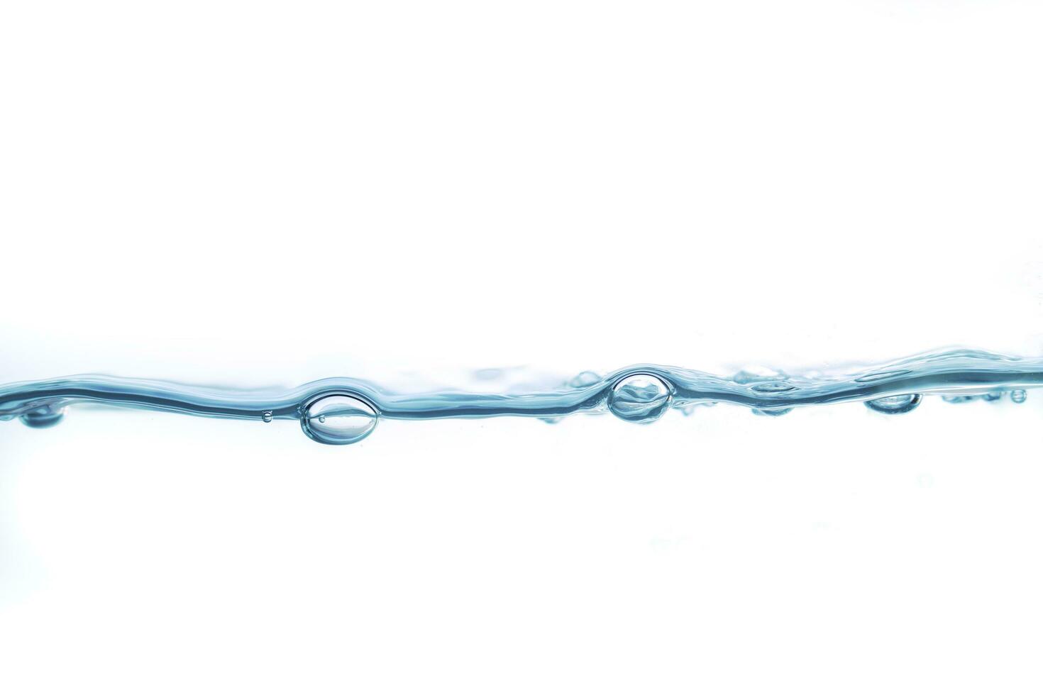 image of water with clear water bubbles set against a white background. photo