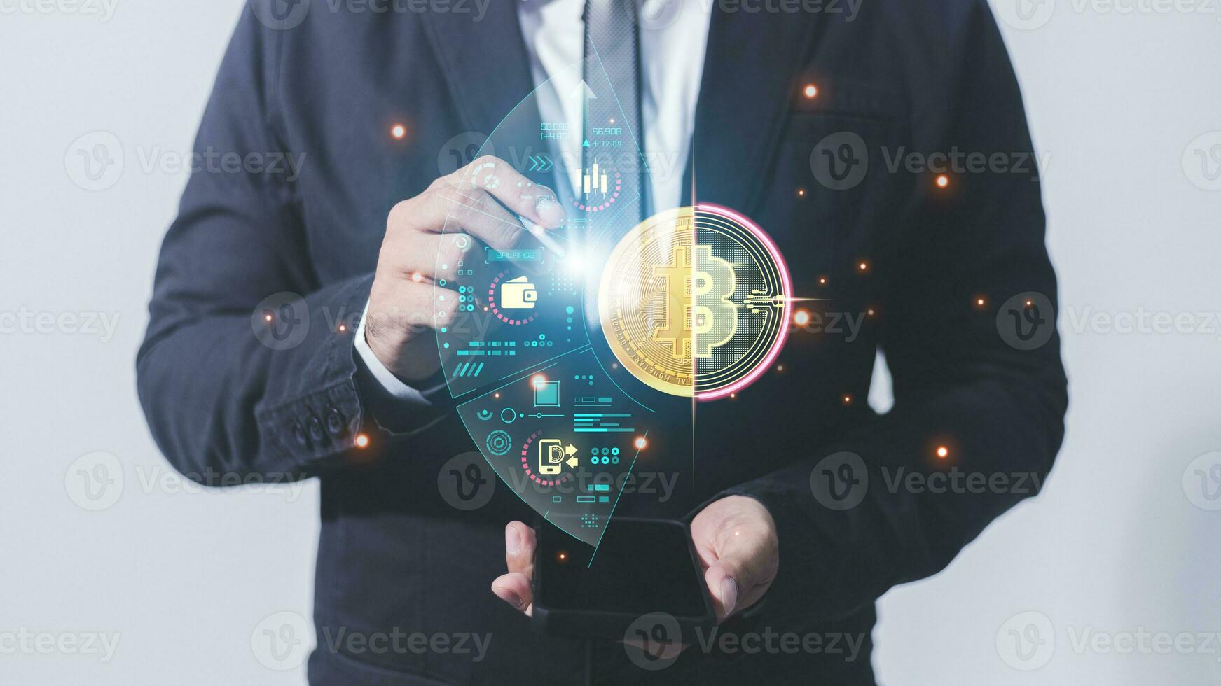 Businessman holding mobile phone with digital bitcoin hologram. Cryptocurrency concept. photo