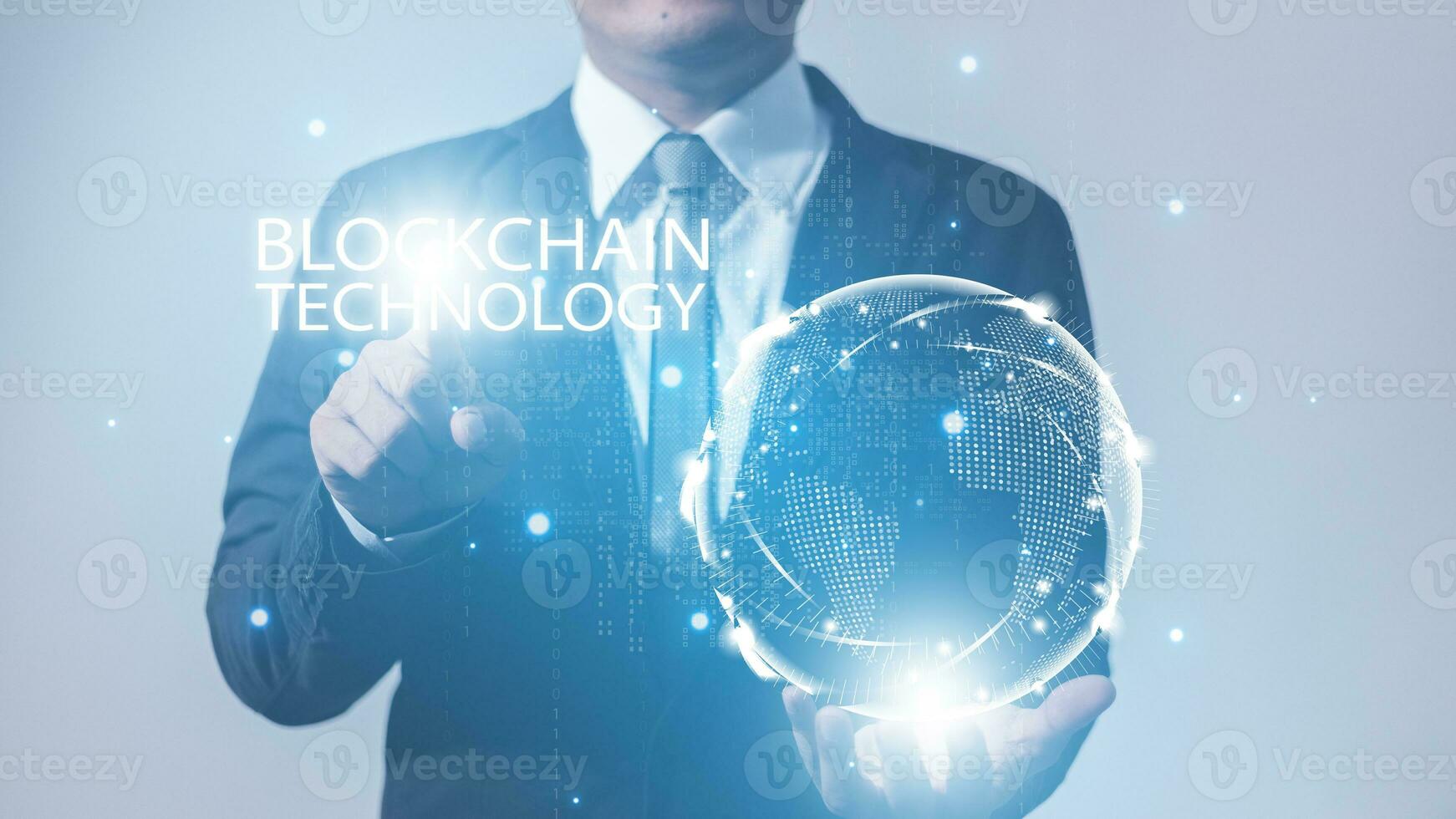 businessman holding global network connection and touch hologram blockchain digital technology. photo