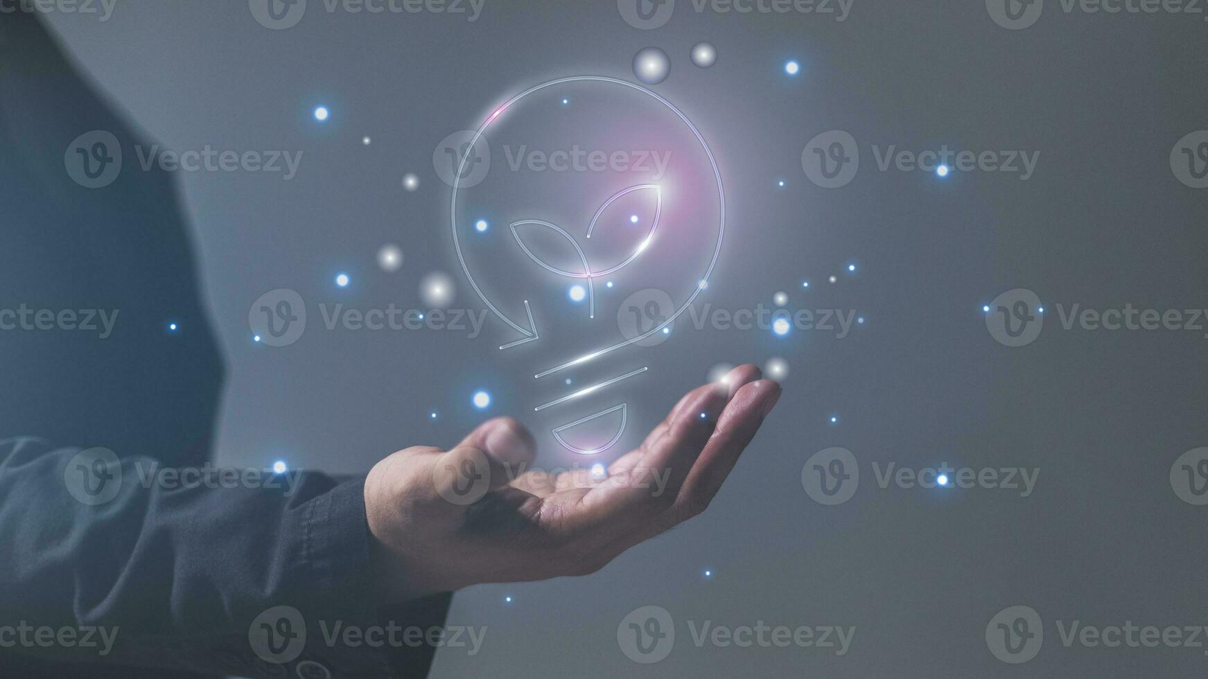 Businessman holding a glowing lightbulb in his hand 3D rendering photo