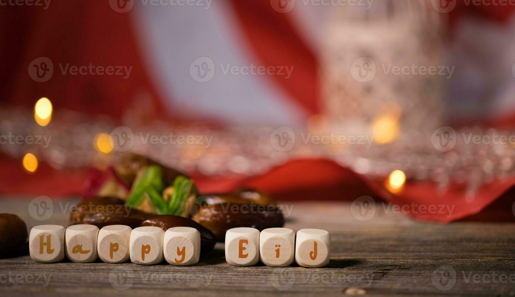 Happy eid on wooden cube photo