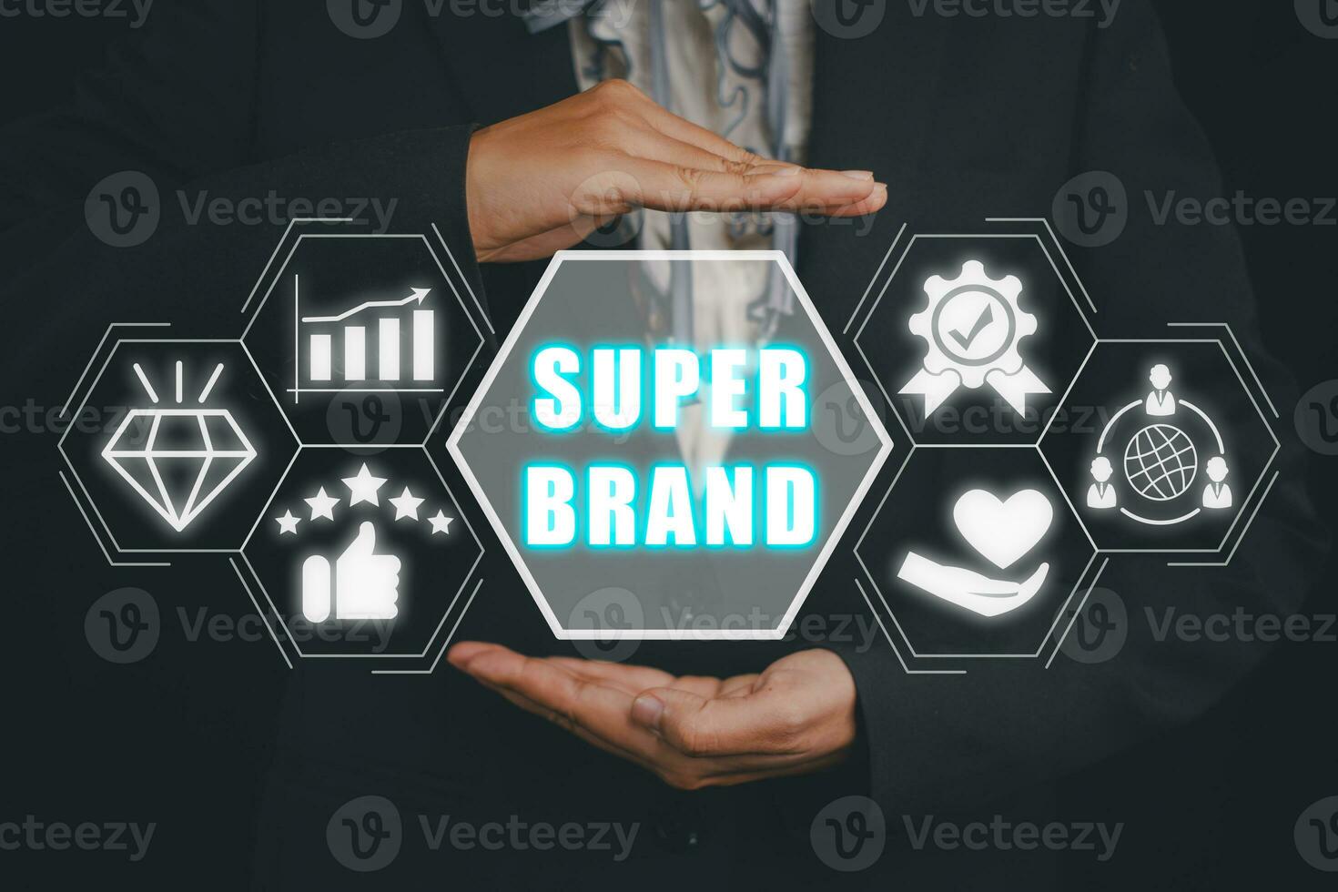 Super brand concept, Business person hand holding super brand icon on virtual screen. photo