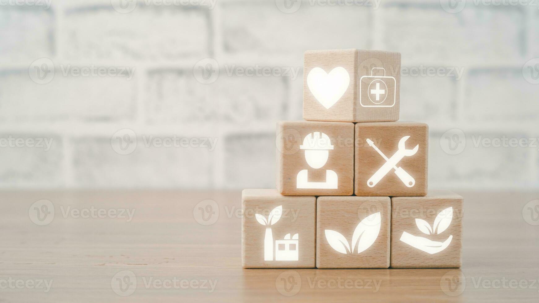 Health safety environment HSE education industry Concept, Man hand holding wooden cube block with Health safety environment icon with copy space. photo