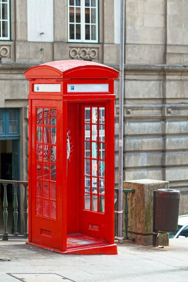 Porto, Portugal - June 03 2018 - Traditional red Portuguese phone booth photo