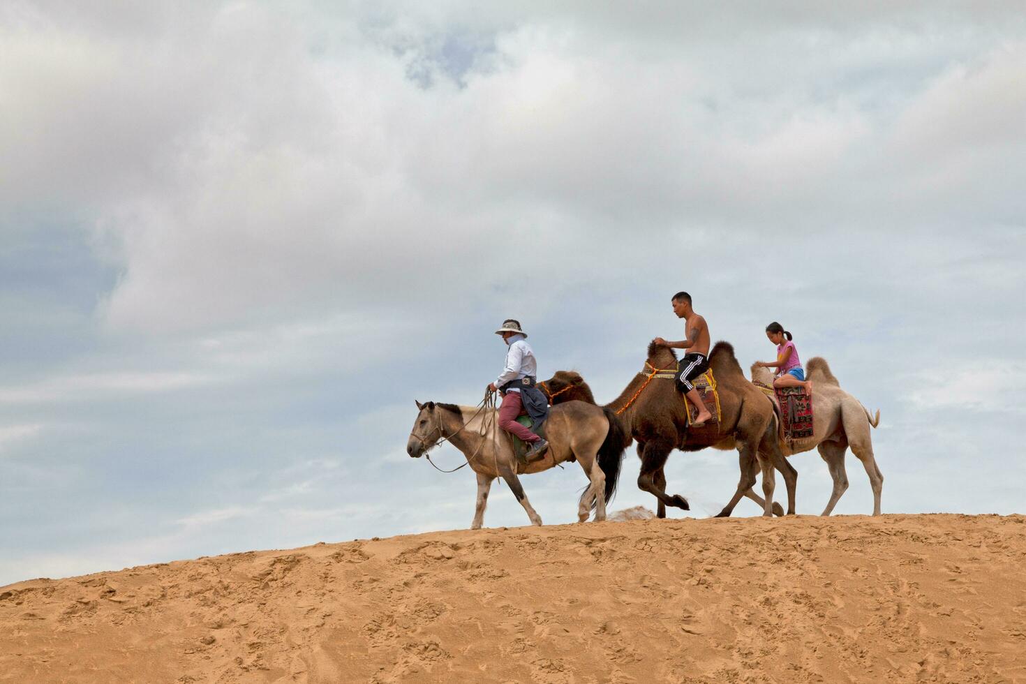 Elsen Tasarkhai, Mongolia - August 14 2019 -  Horse riding in Elsen Tasarkhai in Mongolia photo