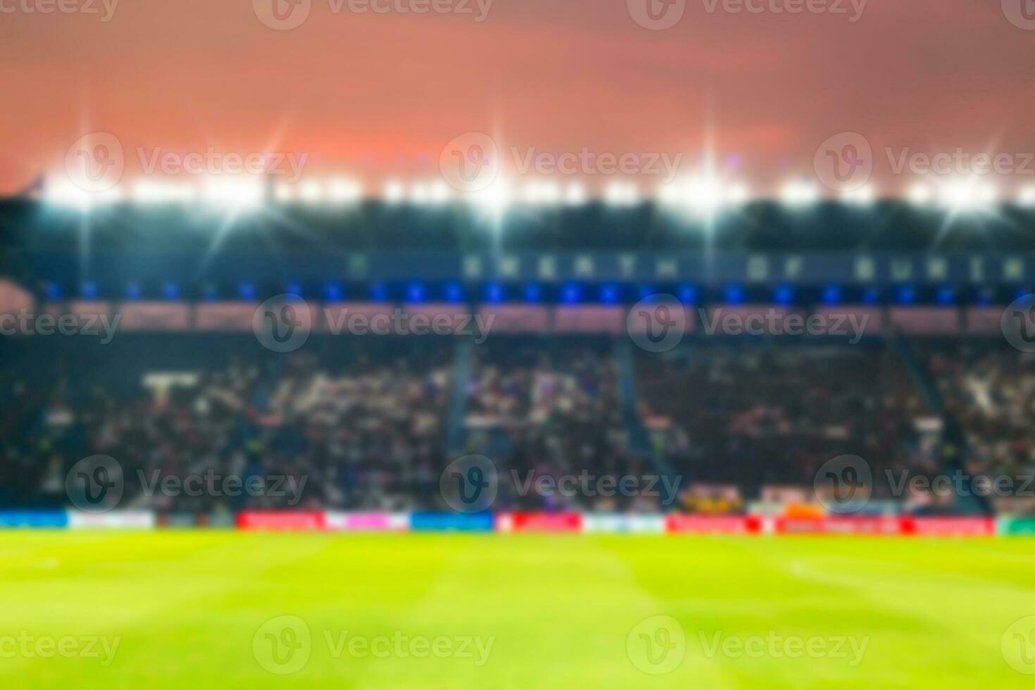 Blurry de-focused stadium football  twilight background. photo