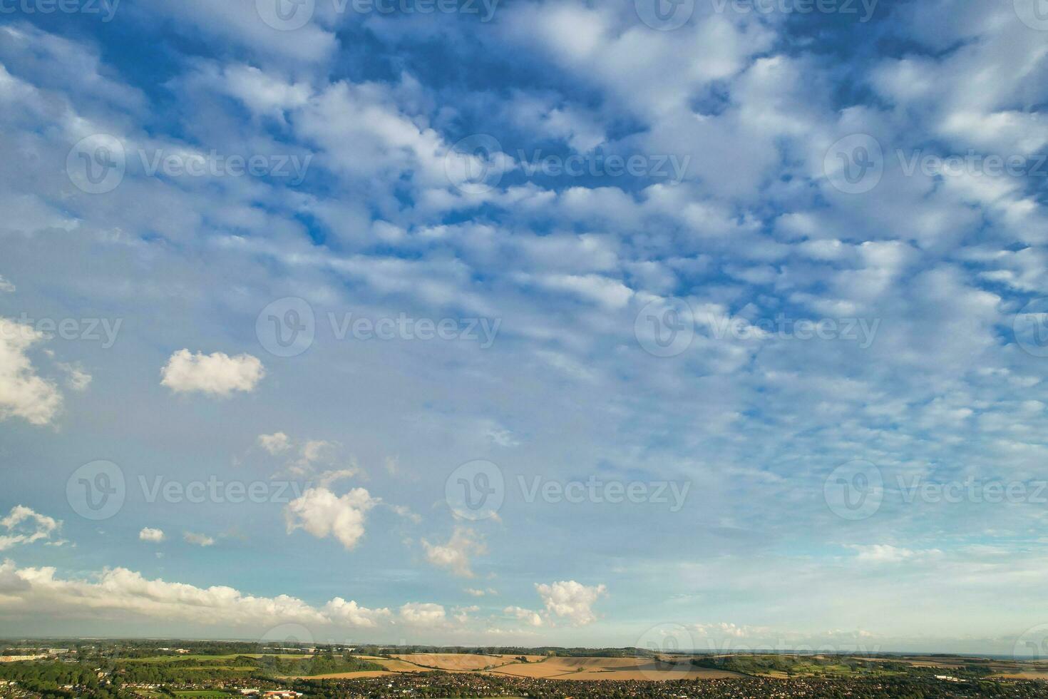 High Angle Drone's Camera Panoramic View of Dramatic Clouds and Sky over the Luton City of England UK, photo