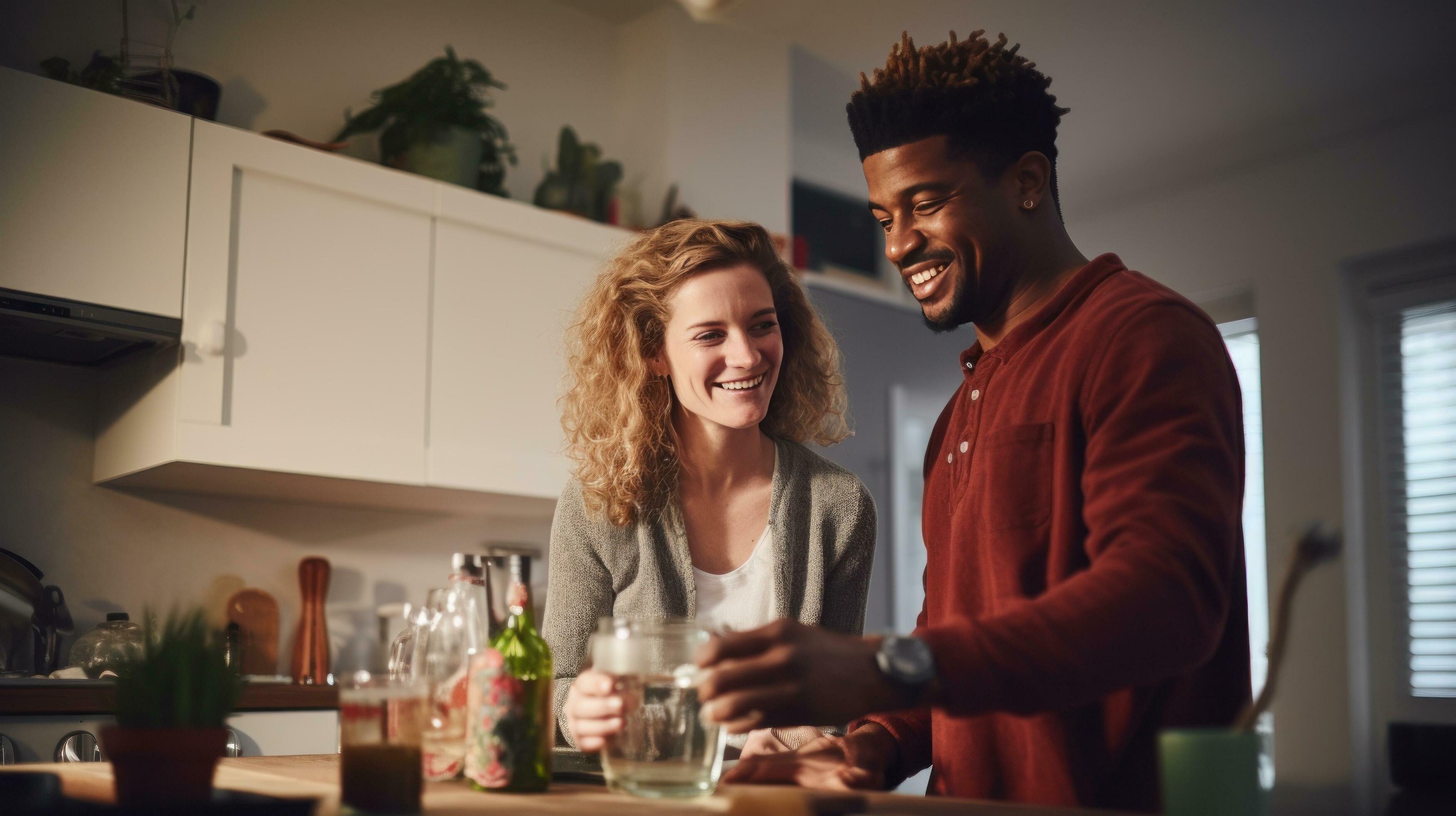 Black man and chinese woman cooking breakfast together. 27428526