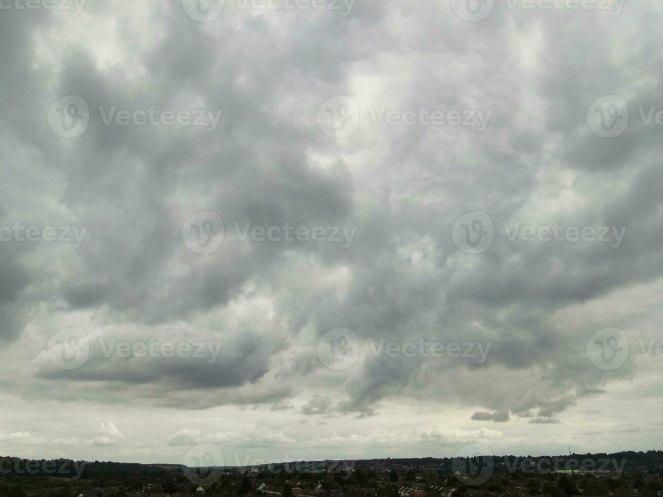 High Angle Drone's Camera Footage of Dramatic Clouds and Sky over the Luton City of England UK, August 4th, 2023 photo