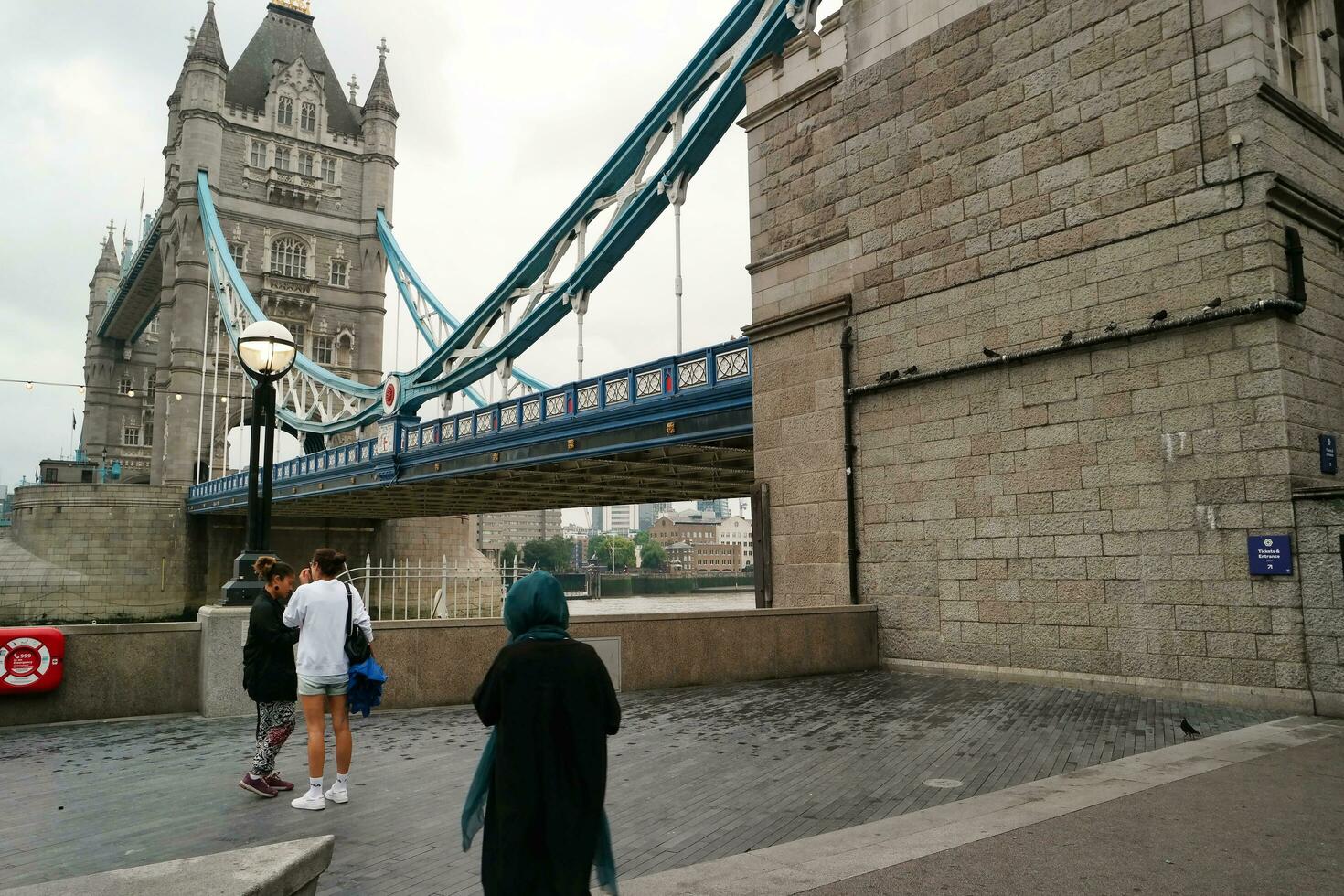 Most Beautiful Image of People Are Enjoying the Tour of London Bridge and River Thames. Most Attractive Tourist Attraction of Central London Capital City of England Great Britain UK. June 18th, 2023 photo