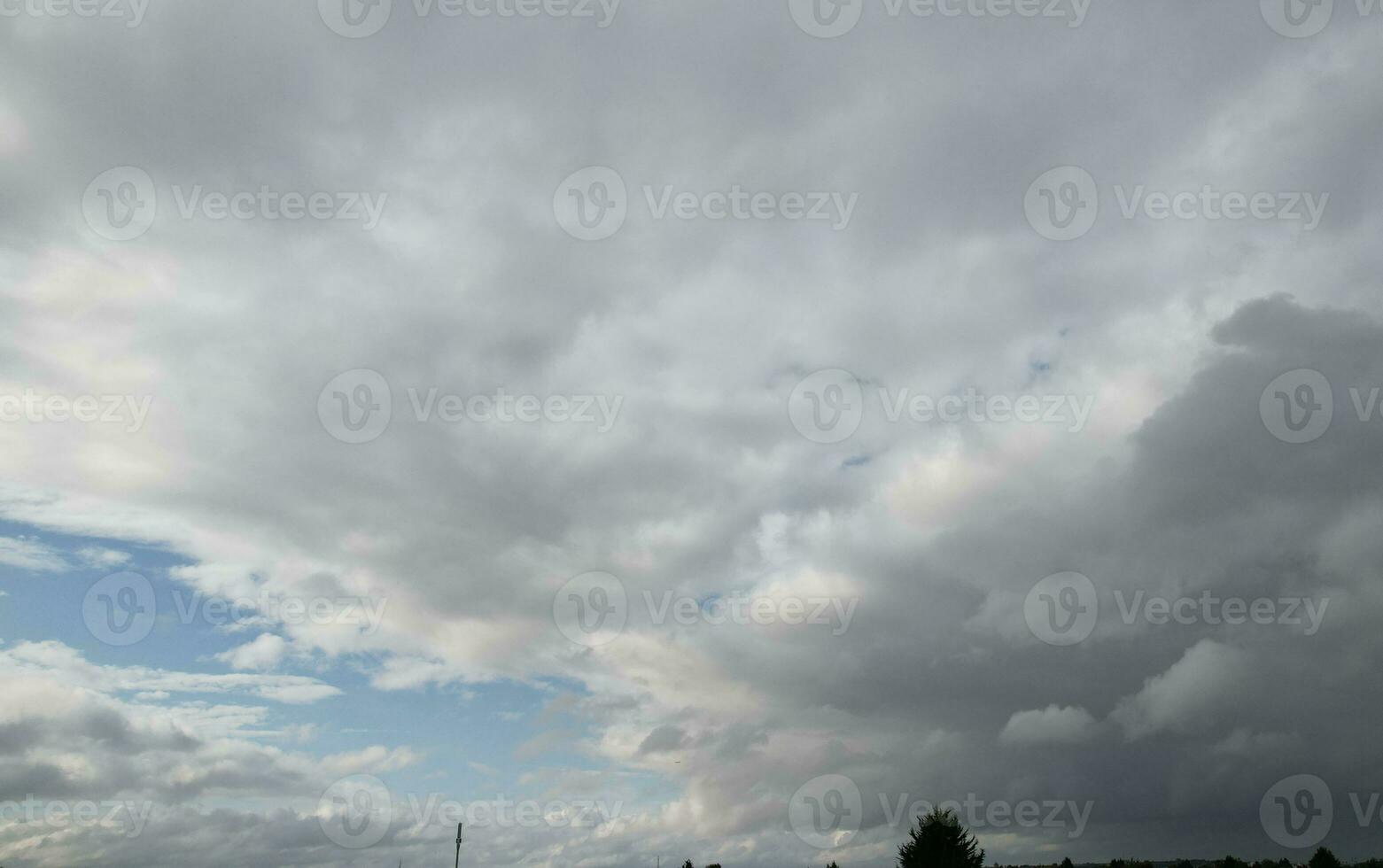 High Angle Drone's Camera Footage of Dramatic Clouds and Sky During Sunset over the Luton City of England UK. July 31st, 2023 photo