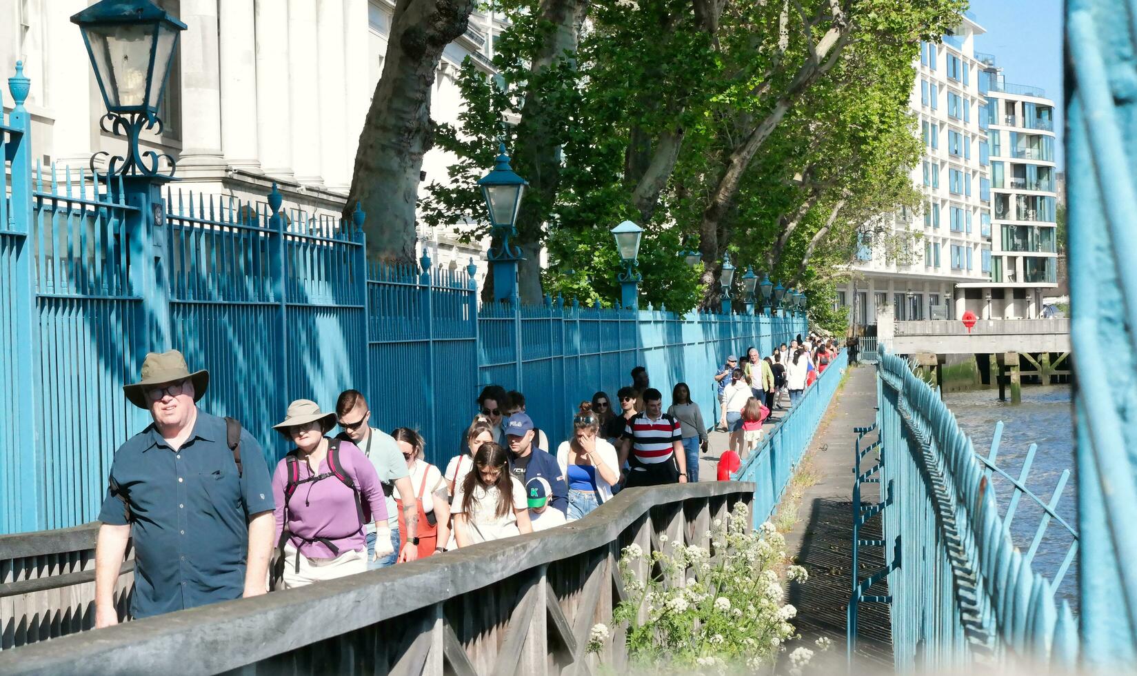 Most Beautiful Image of International Community Tourist People are Visiting Tower Bridge and River Thames at Central London Capital City of England Great Britain UK on Sunny Day of June 4th, 2023 photo