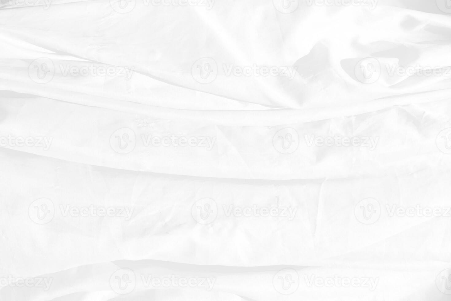 Top view Abstract White cloth background with soft waves.Wave and curve overlapping with different shadow of color,white fabric, crumpled fabric. photo