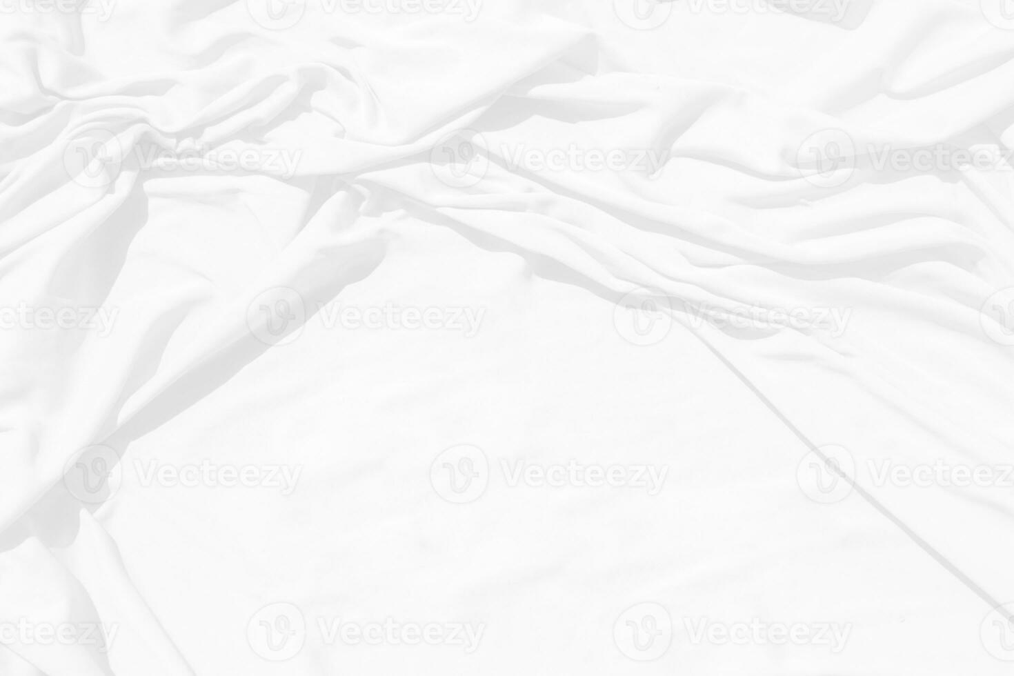 Top view Abstract White cloth background with soft waves.Wave and curve overlapping with different shadow of color,white fabric, crumpled fabric. photo