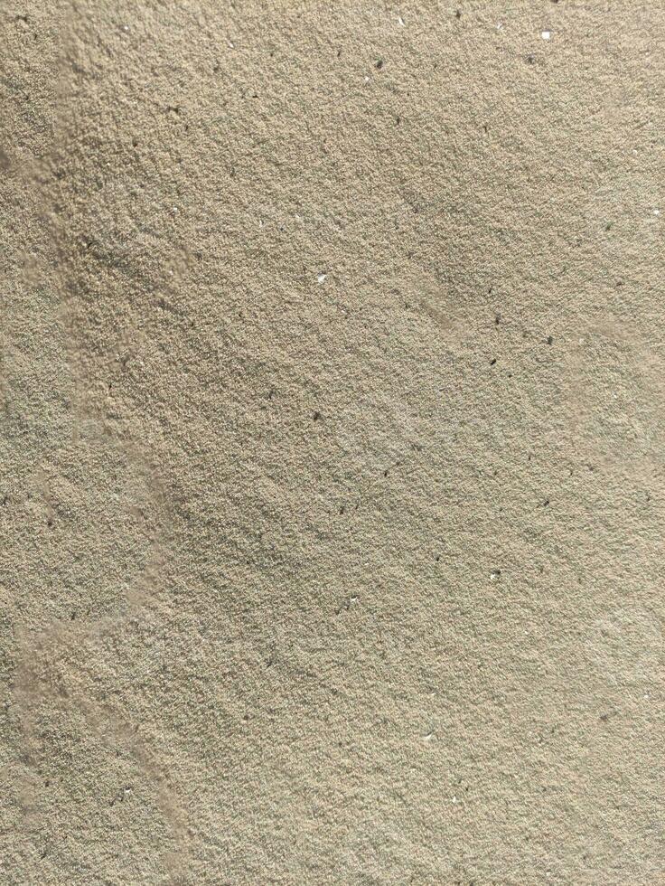 arena textura cerca vista, suelo modelo foto