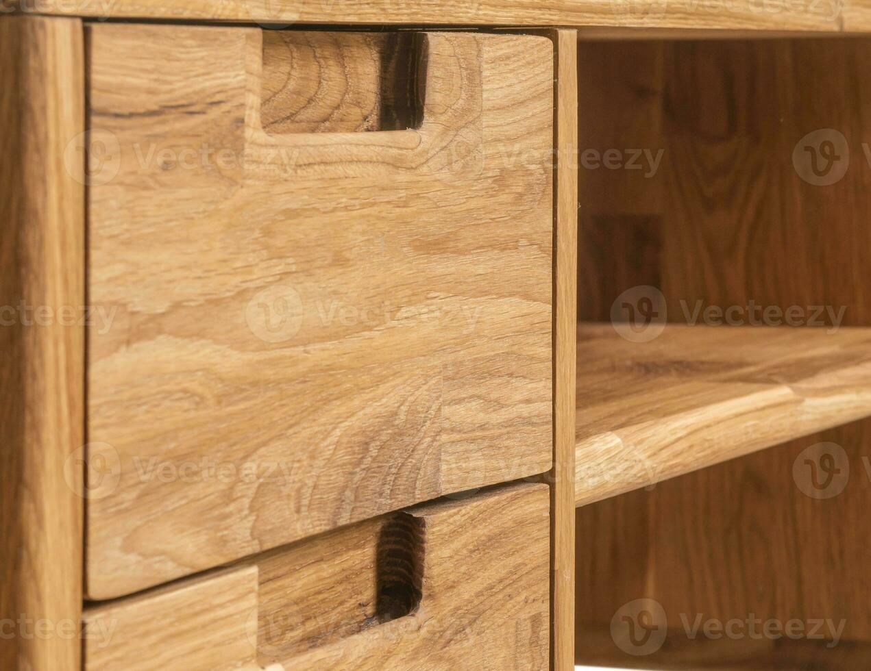 Table drawers with handles close view photo, wooden furniture background photo