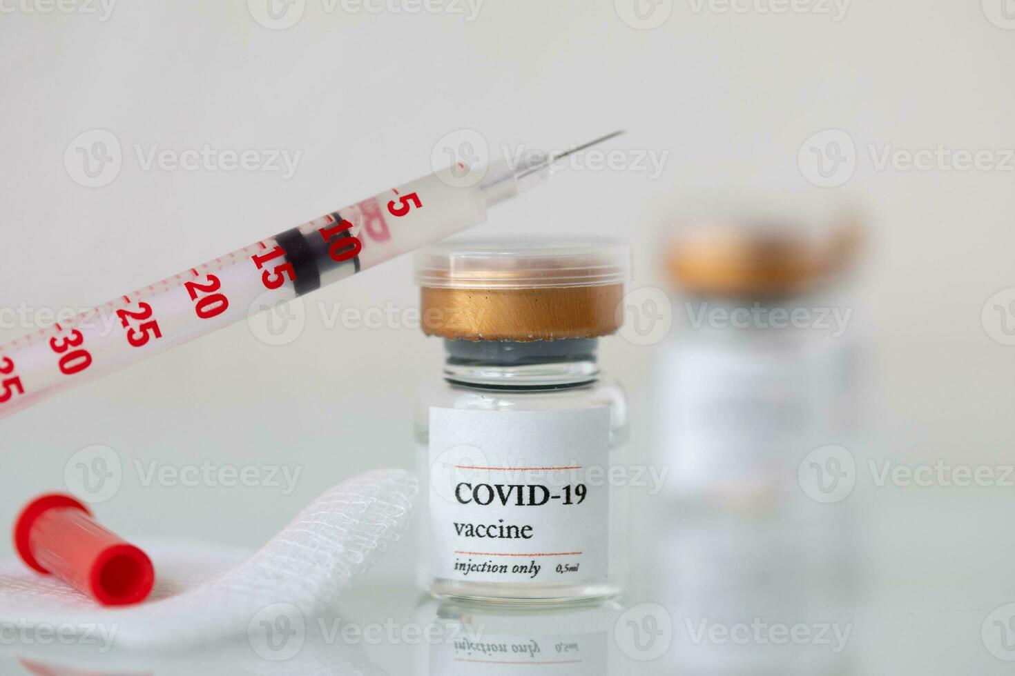 covid-19 vaccine in syringe photo