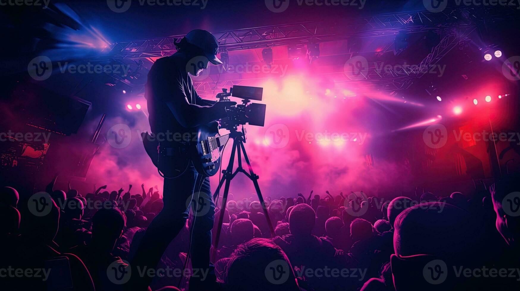 A professional business records and streams live concerts using camcorders. silhouette concept photo